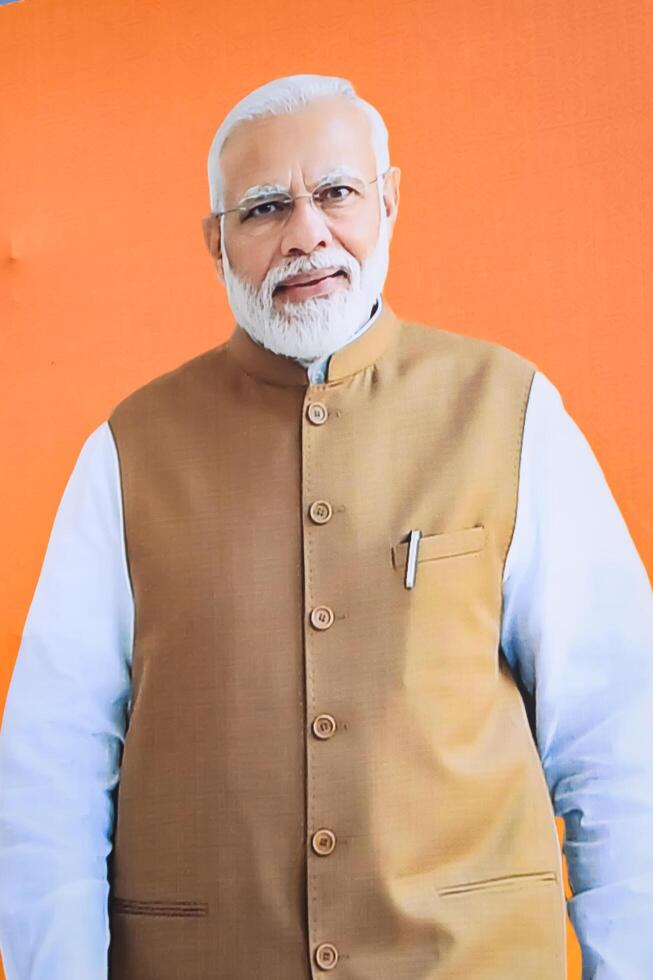 New Delhi, India - February 17 2024 - Prime Minister Narendra Modi cut out during BJP road show, the statue of PM Modi while attending a big election rally in the capital photo