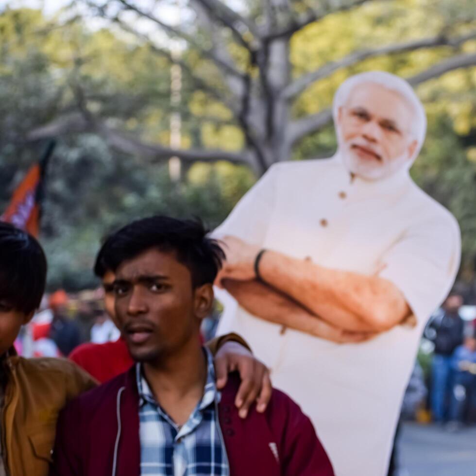 New Delhi, India - February 17 2024 - Prime Minister Narendra Modi cut out during BJP road show, the poster of PM Modi while attending a big election rally in the capital photo