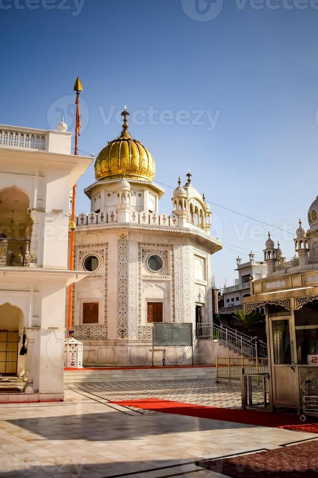 View of details of architecture inside Golden Temple - Harmandir Sahib in Amritsar, Punjab, India, Famous indian sikh landmark, Golden Temple, the main sanctuary of Sikhs in Amritsar, India photo
