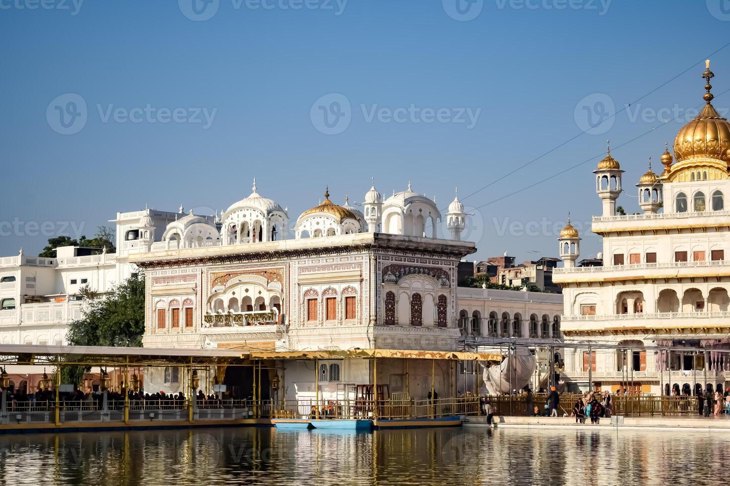 View of details of architecture inside Golden Temple - Harmandir Sahib in Amritsar, Punjab, India, Famous indian sikh landmark, Golden Temple, the main sanctuary of Sikhs in Amritsar, India photo