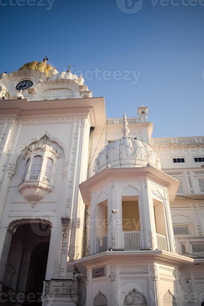 View of details of architecture inside Golden Temple - Harmandir Sahib in Amritsar, Punjab, India, Famous indian sikh landmark, Golden Temple, the main sanctuary of Sikhs in Amritsar, India photo