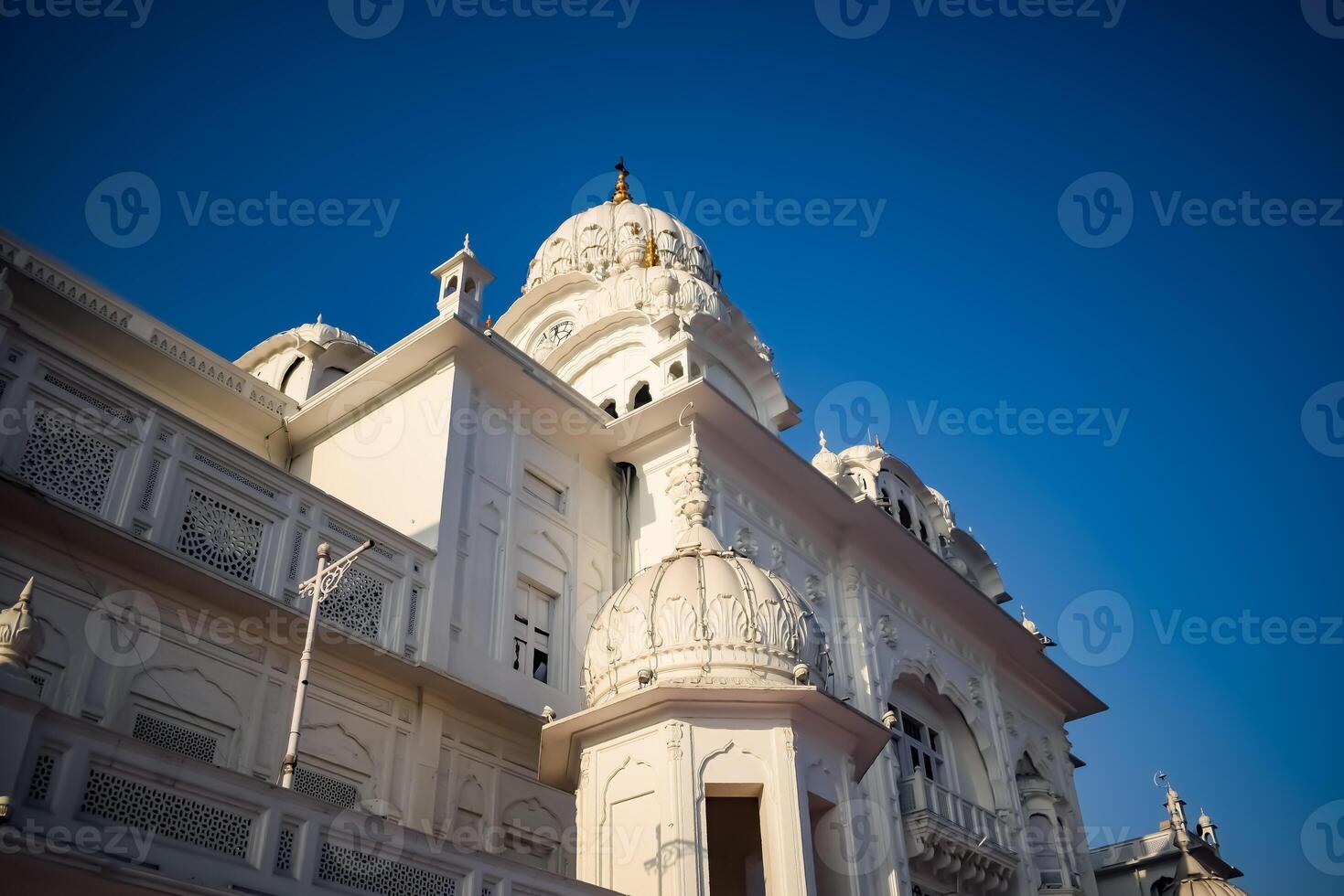View of details of architecture inside Golden Temple - Harmandir Sahib in Amritsar, Punjab, India, Famous indian sikh landmark, Golden Temple, the main sanctuary of Sikhs in Amritsar, India photo