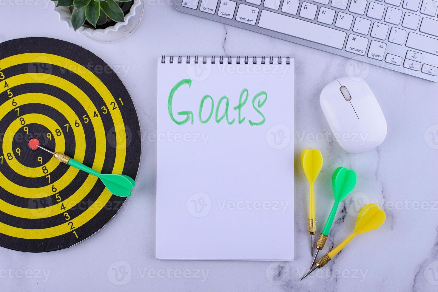 Target and goal concept with darts and arrows photo