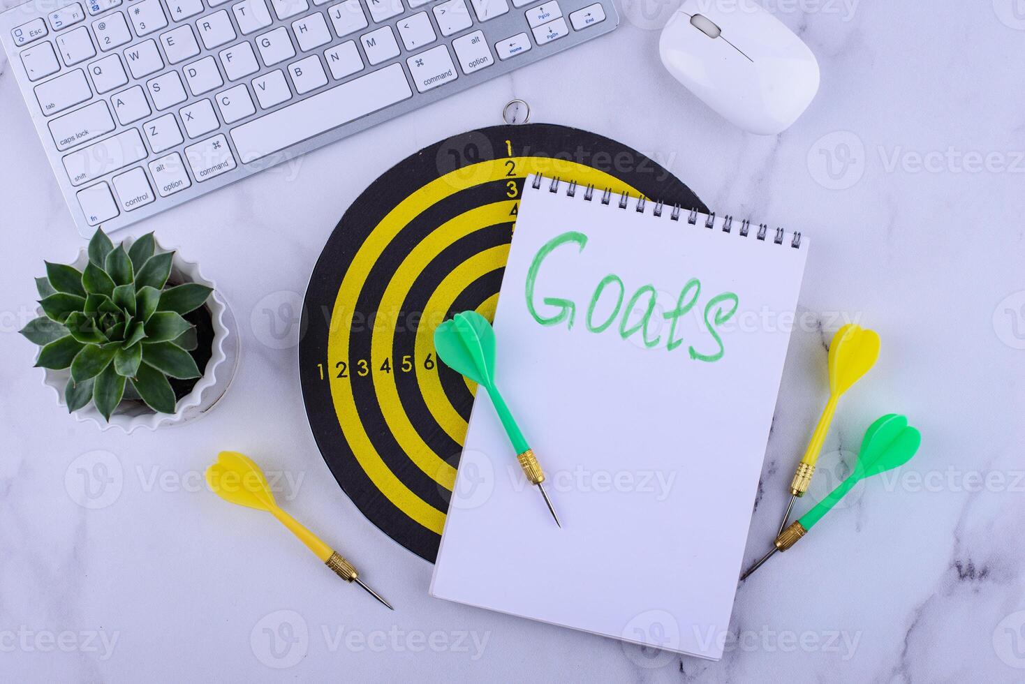 Target and goal concept with darts and arrows photo