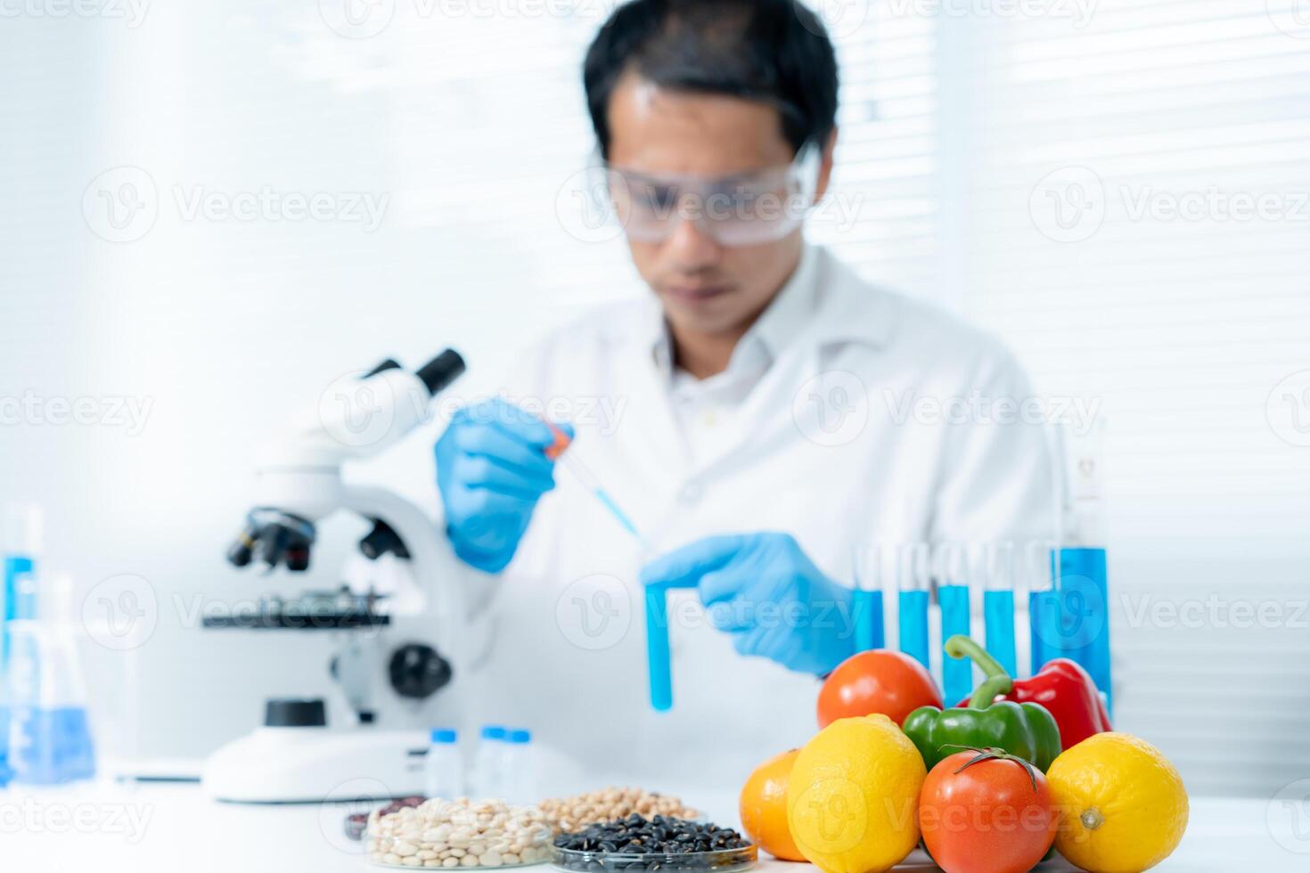 Scientist check chemical food residues in laboratory. Control experts inspect quality of fruits, vegetables. lab, hazards, ROHs, find prohibited substances, contaminate, Microscope, Microbiologist photo