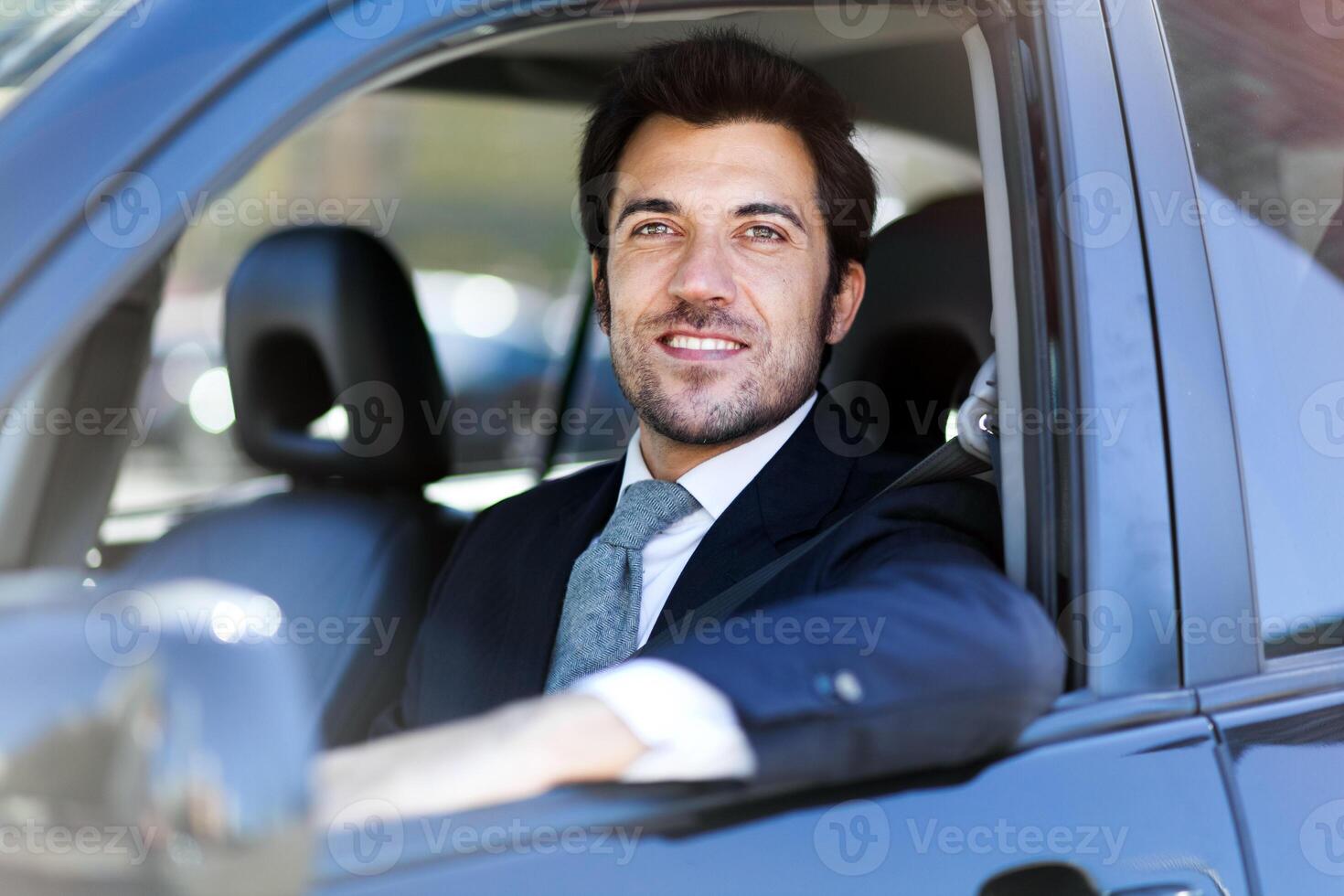 Man driving a car photo