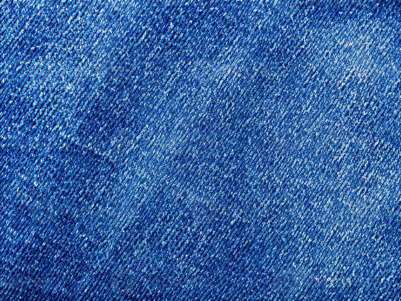 jeans background. close up of a blue jeans background photo