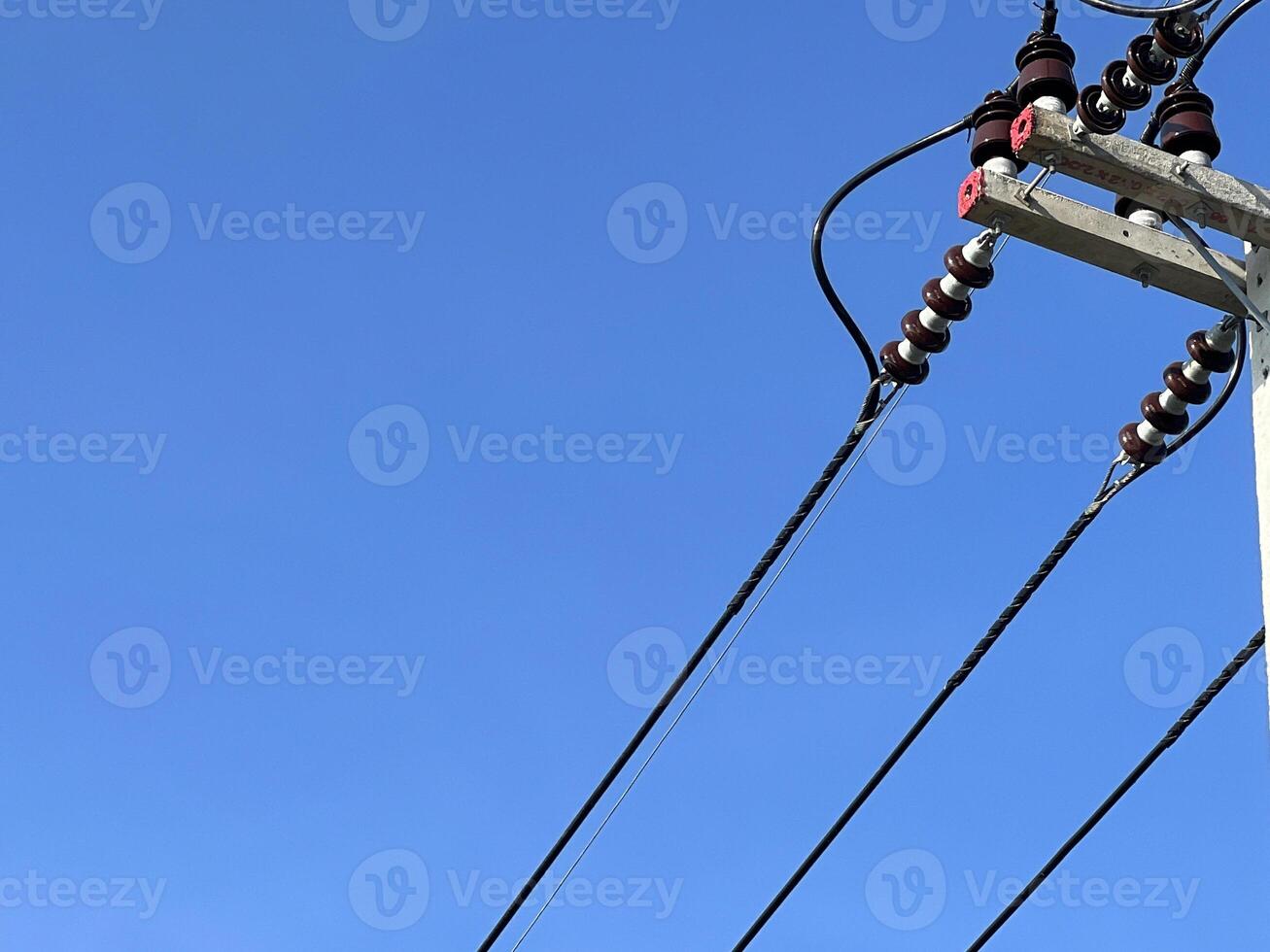 a power pole with a bunch of wires photo
