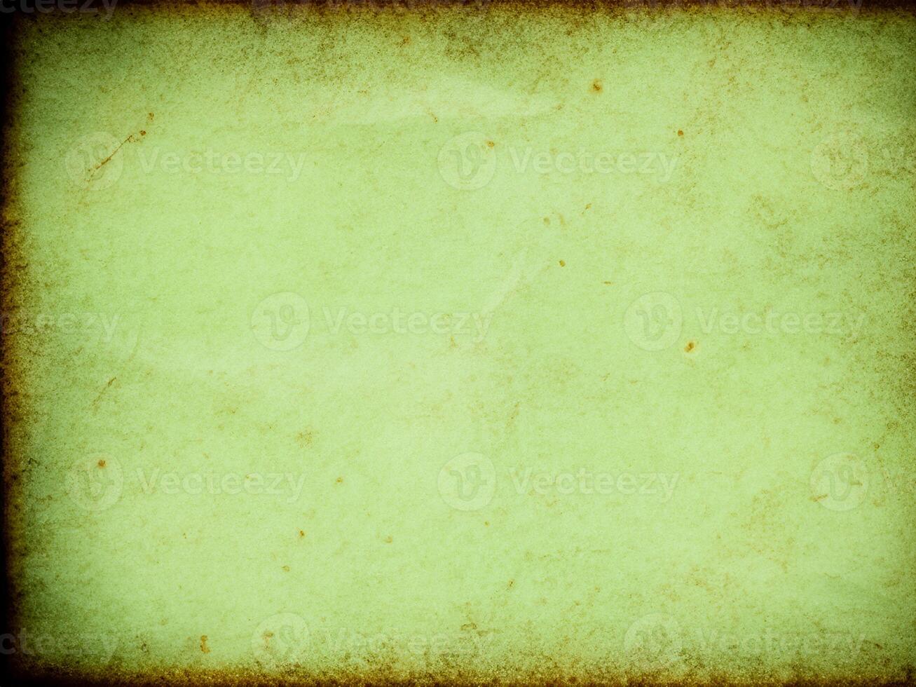 a green background with a grunge effect photo