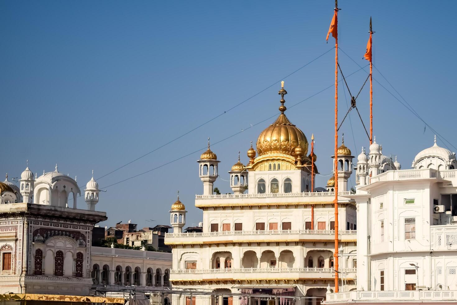 View of details of architecture inside Golden Temple - Harmandir Sahib in Amritsar, Punjab, India, Famous indian sikh landmark, Golden Temple, the main sanctuary of Sikhs in Amritsar, India photo