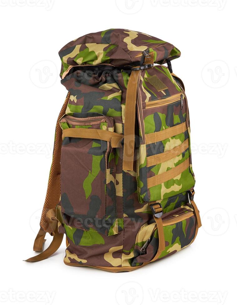 Camouflage backpack on white photo