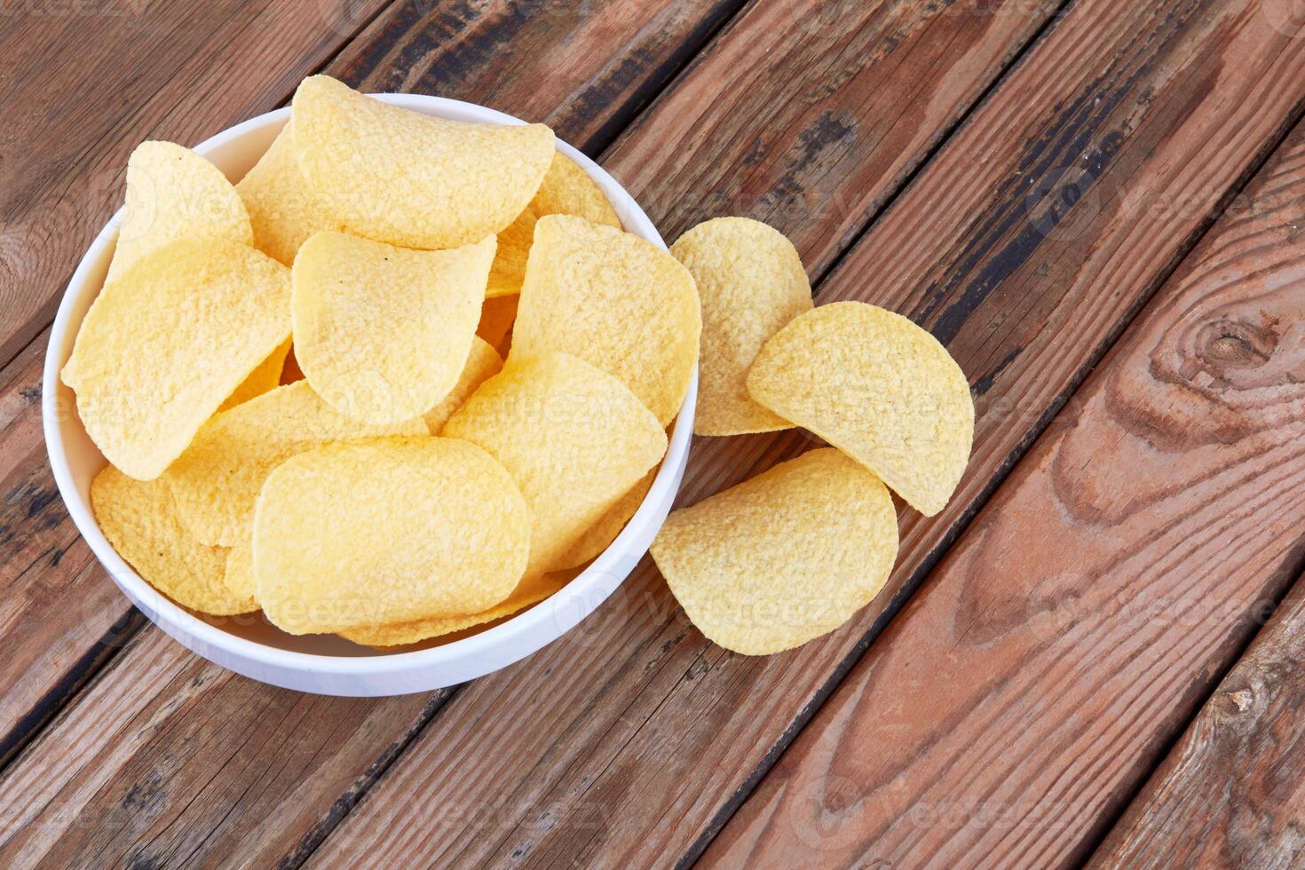 Potato chips in a saucer photo