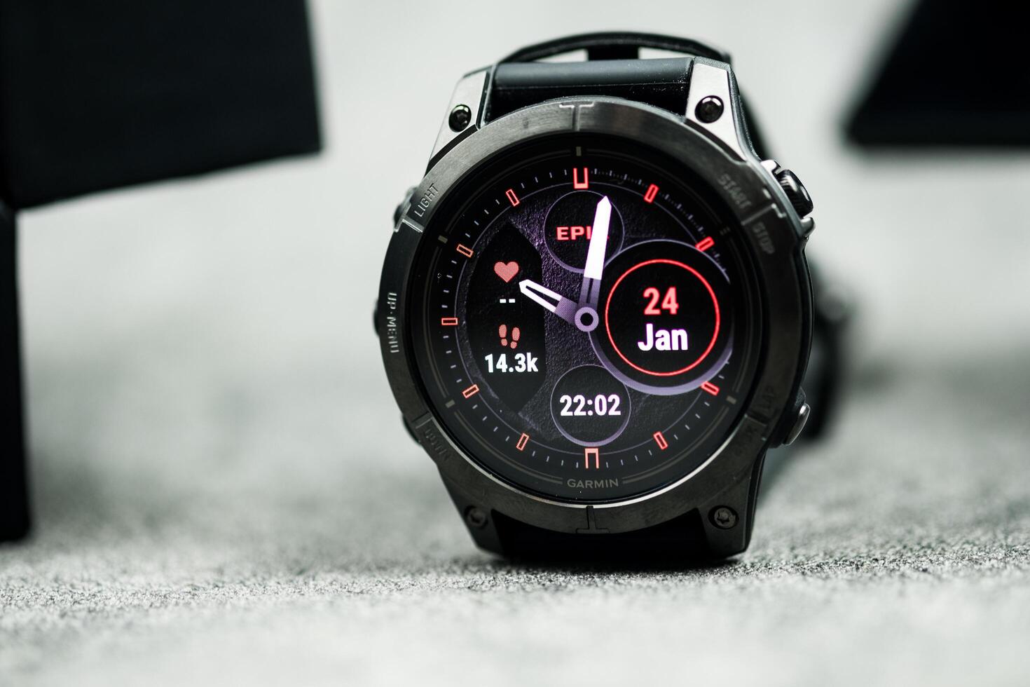 Bangkok, Thailand - January 14, 2024 Multi function on smart watch showing on displaying red shift mode in Garmin Epix Pro Gen 2 photo