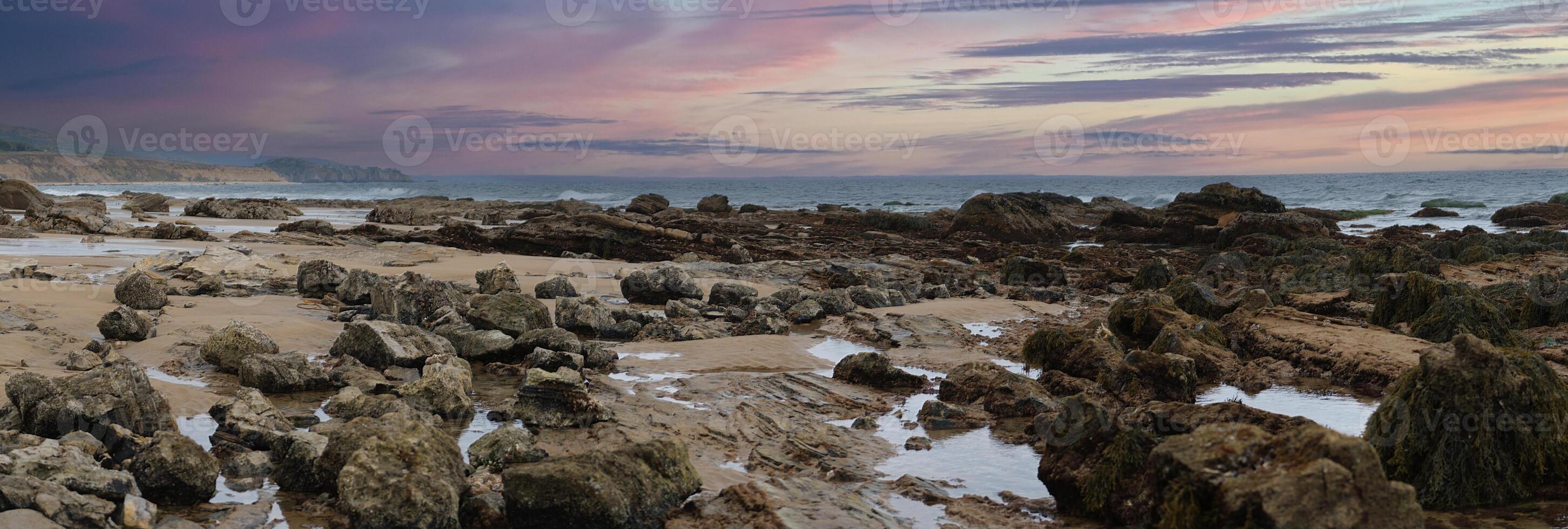 California coastal tidepool beach at sunset panorama photo