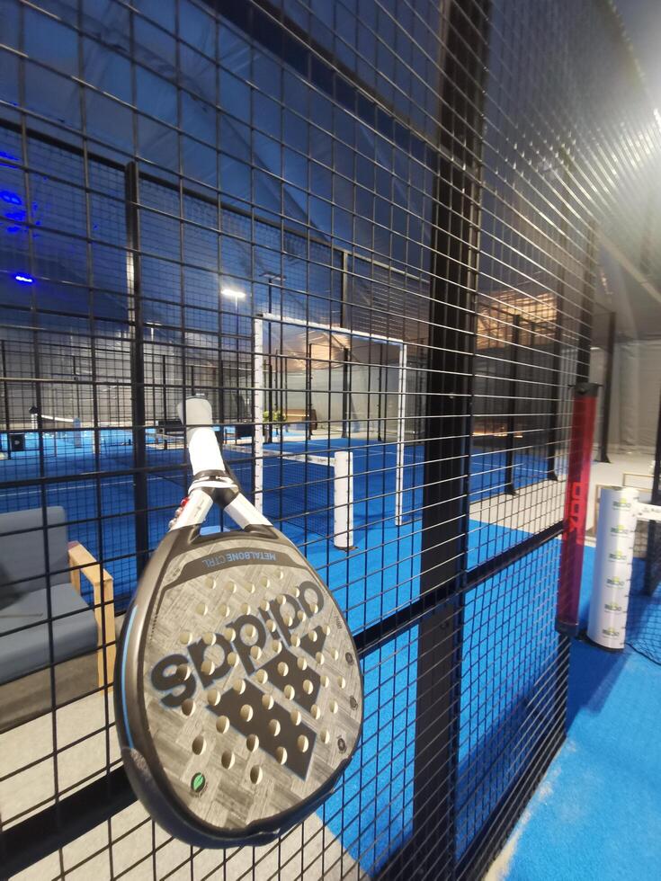 Ukraine, Kyiv January 26, 2024. A Paddle Tennis Racket from the Adidas brand, On An Urban Court. photo