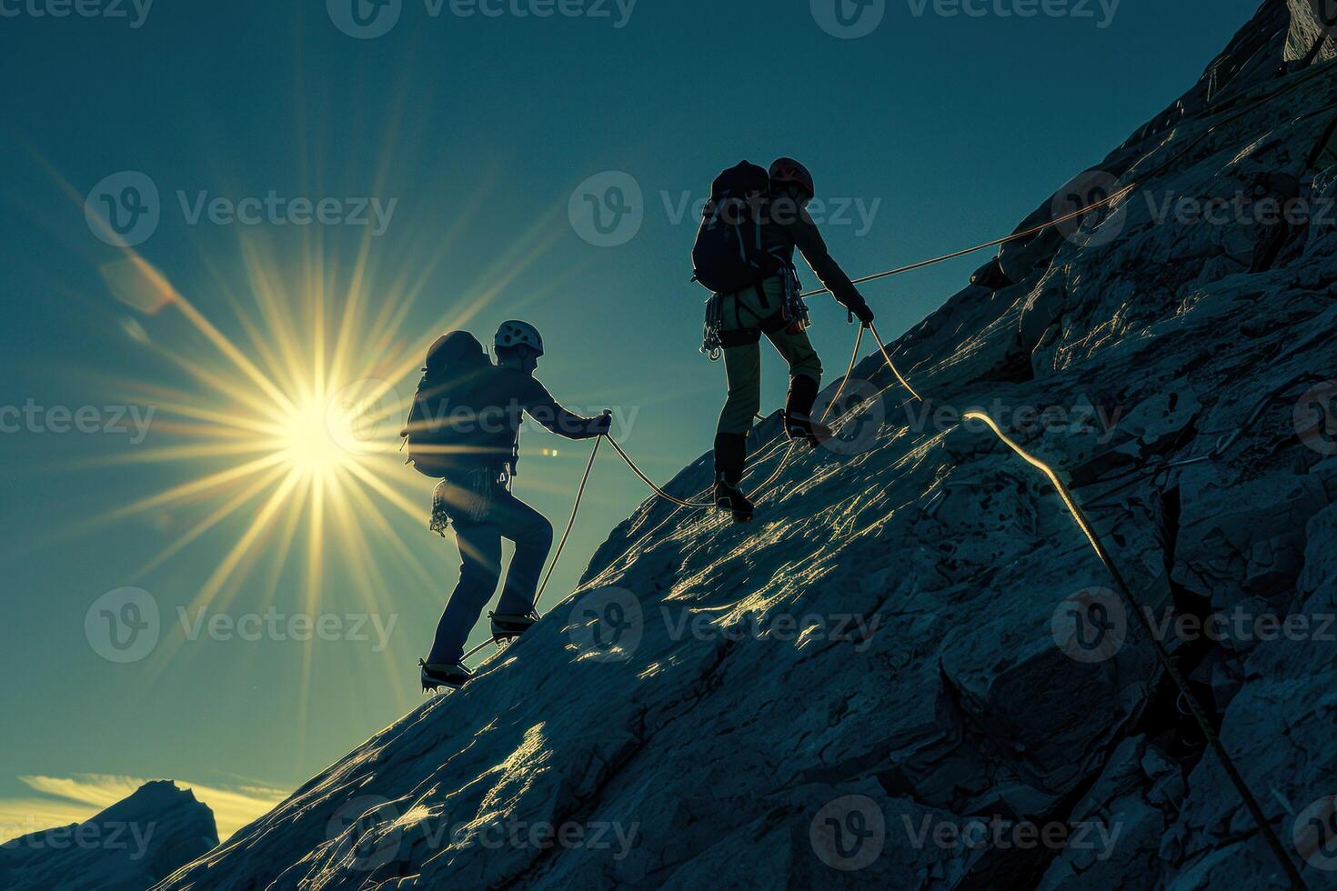 AI generated Silhouettes of Climbers Against Dazzling Sunlight on Mountain. The silhouettes of two climbers are stark against the brilliant sunlight breaking over the mountain peak. photo