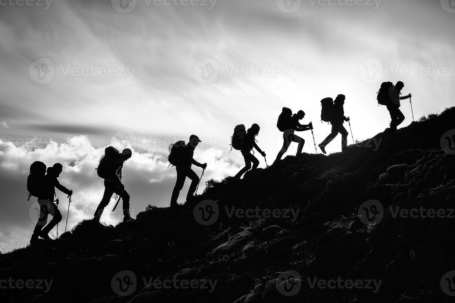 AI generated Silhouetted Hikers Ascending a Steep Hill at Sunrise. A group of hikers, silhouetted against the sky, vigorously ascend a steep hill with the sunrise behind them. photo