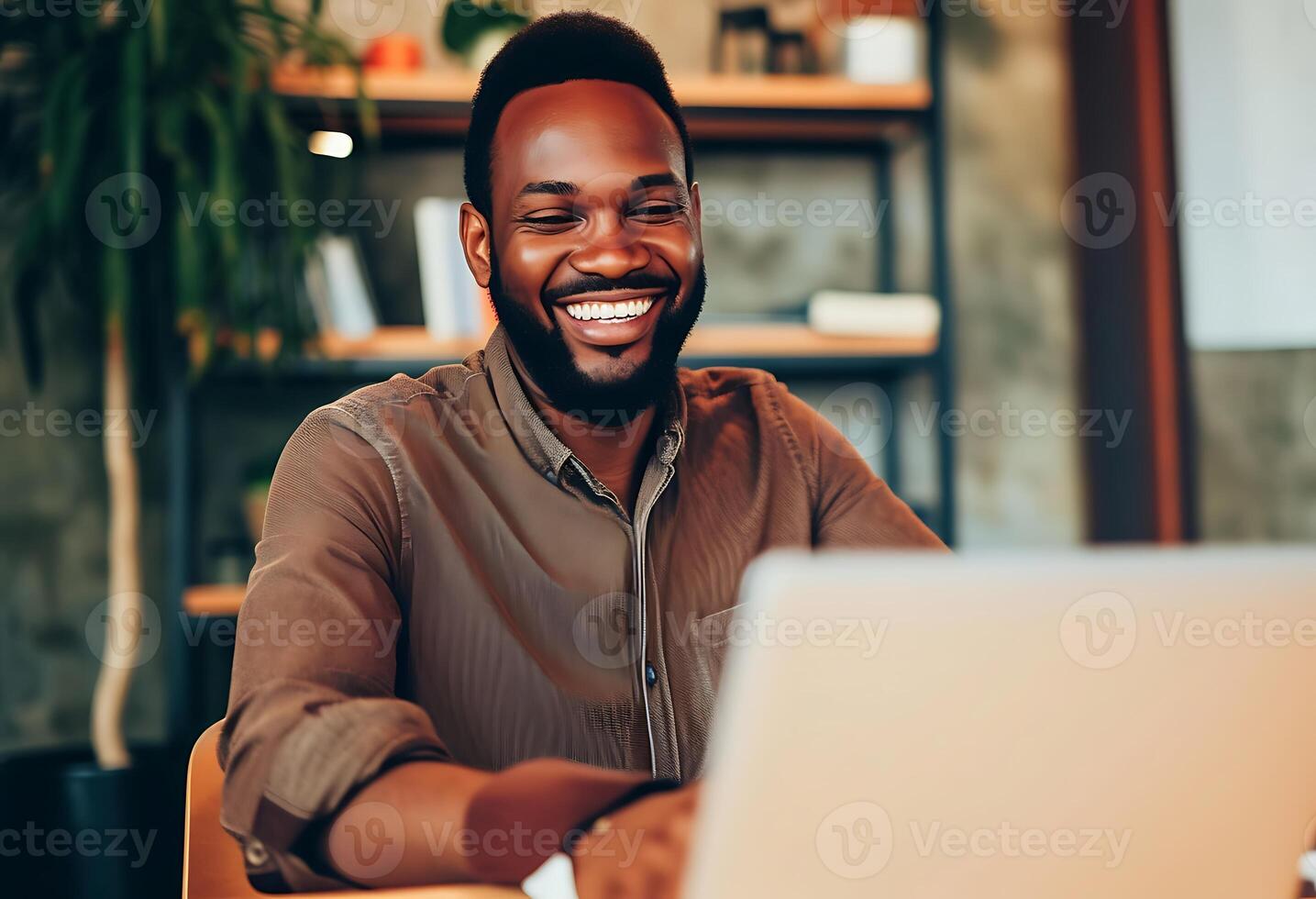 AI generated Smiling Man Sitting at Table With Laptop. Generative AI. photo