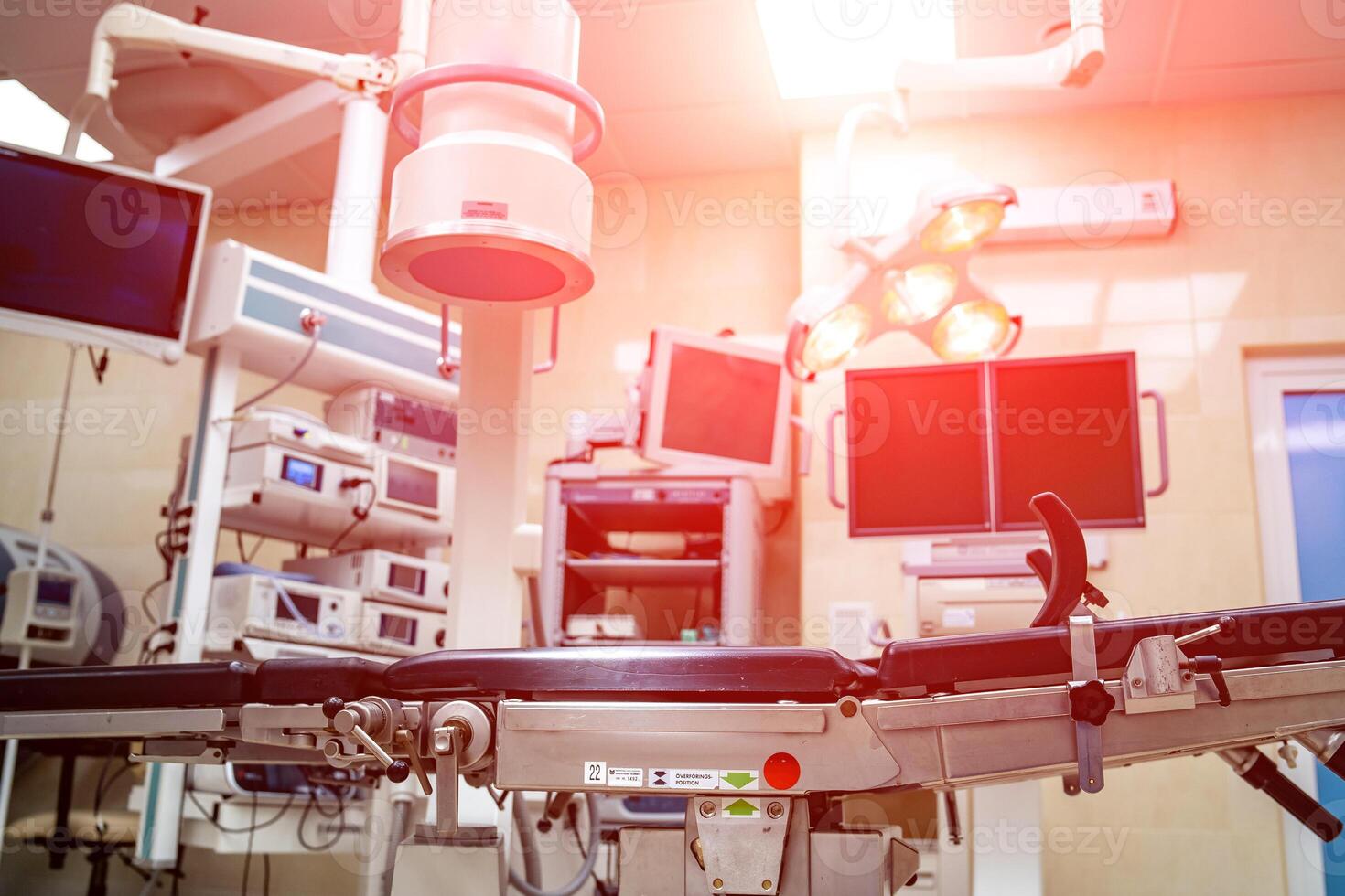 Equipment and medical devices in modern operating room. Operating theatre. Selective focus. photo