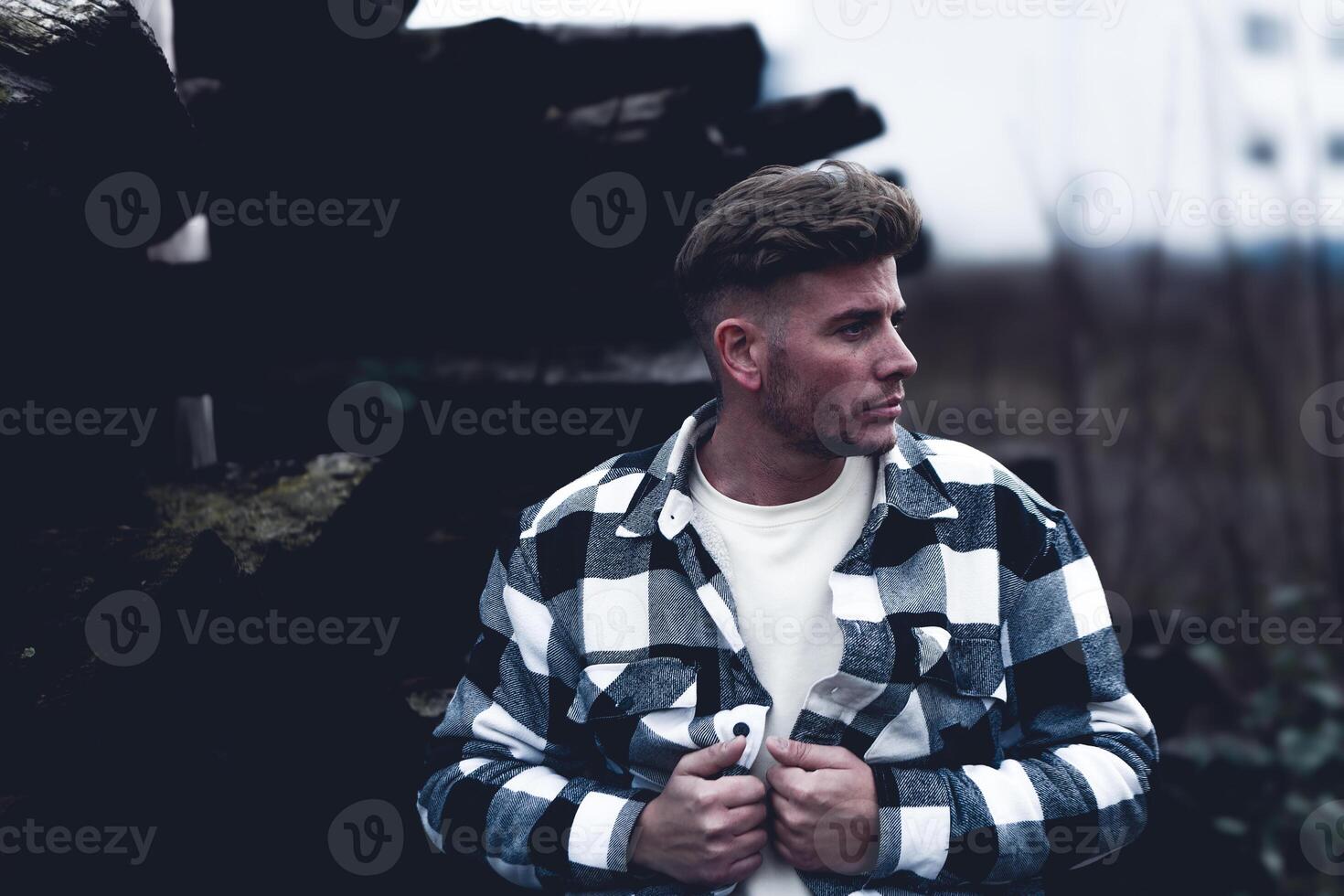 attractive young man in a denim shirt photo