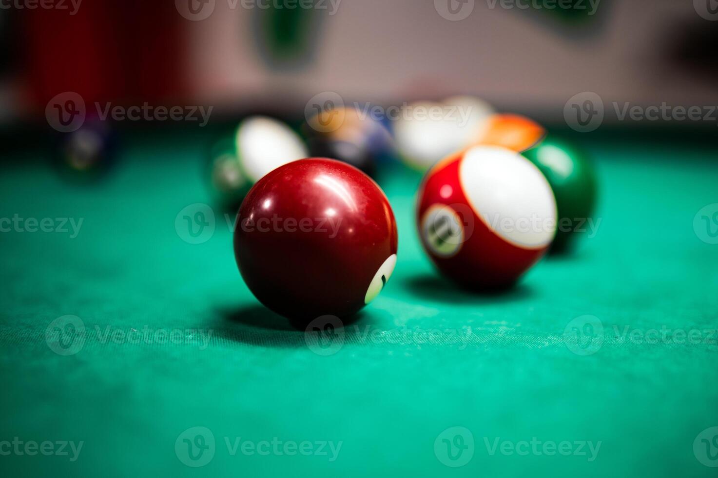 Closeup shot of billiard balls on a pool table photo