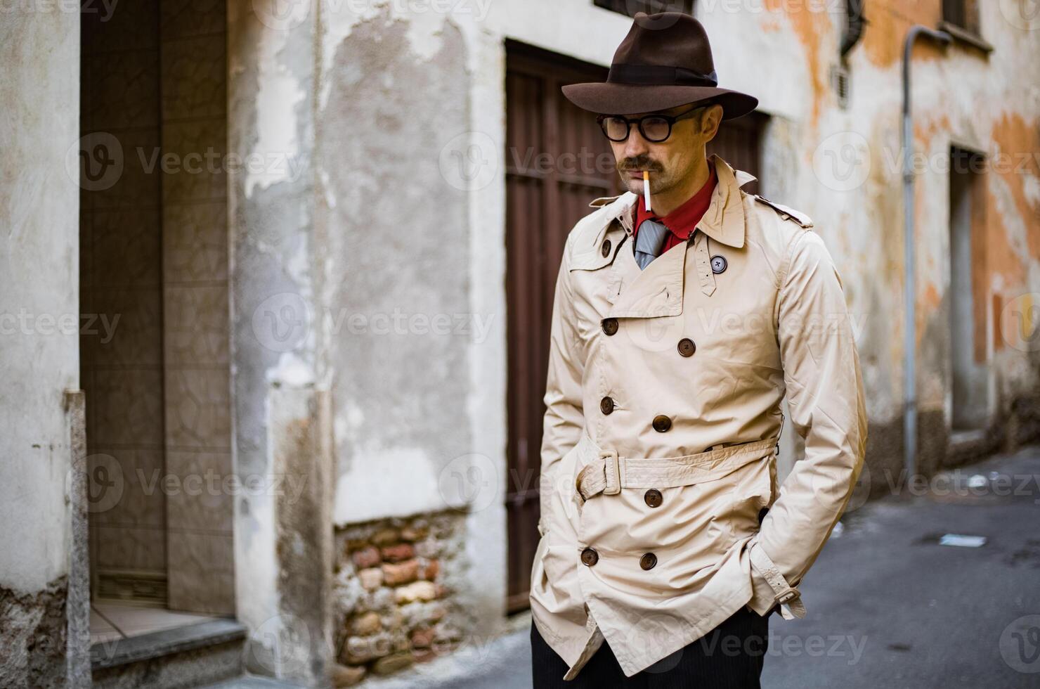 Detective walking in the city slums photo