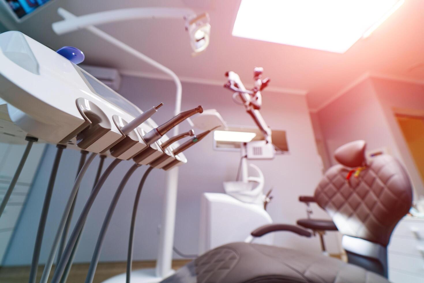 Equipment and dental instruments in dentist's office. Tools close-up. Dentistry. Stomatological tools. photo