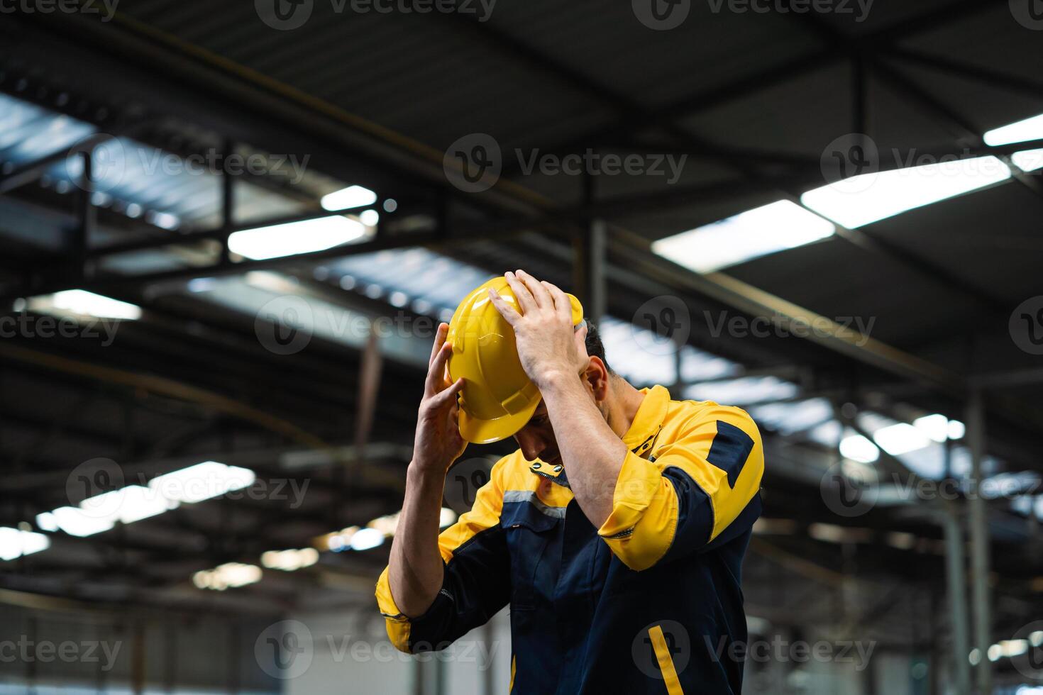 Professional engineer or worker or engineers who work with machines in industrial plants. from behind. photo