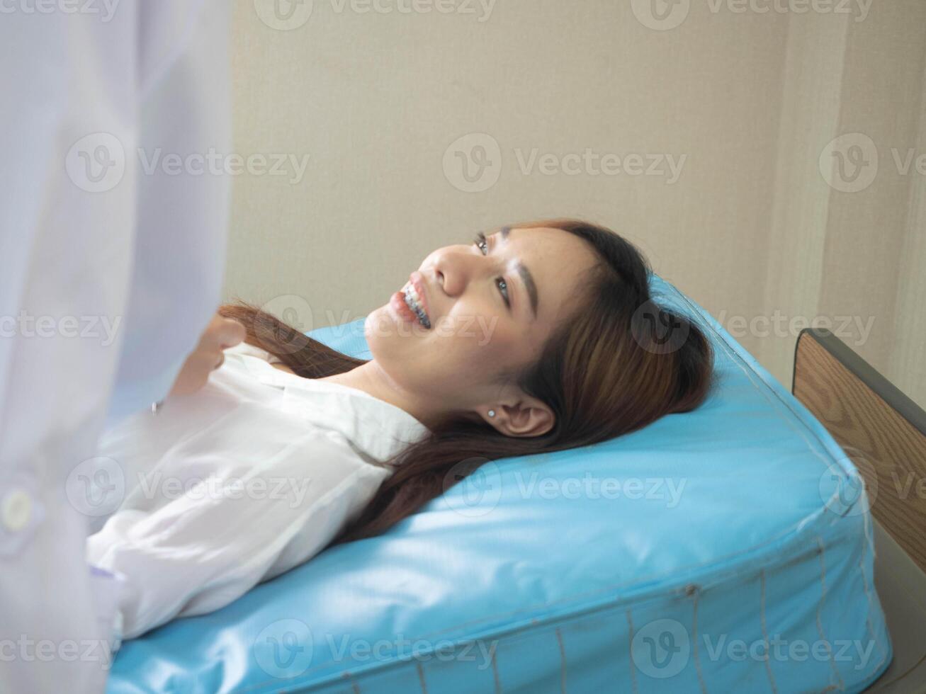 sleep female woman girl person people human happy smile patient visit doctor hospital illness stethoscope treatment health care indoor room illness disease support senior support professional photo