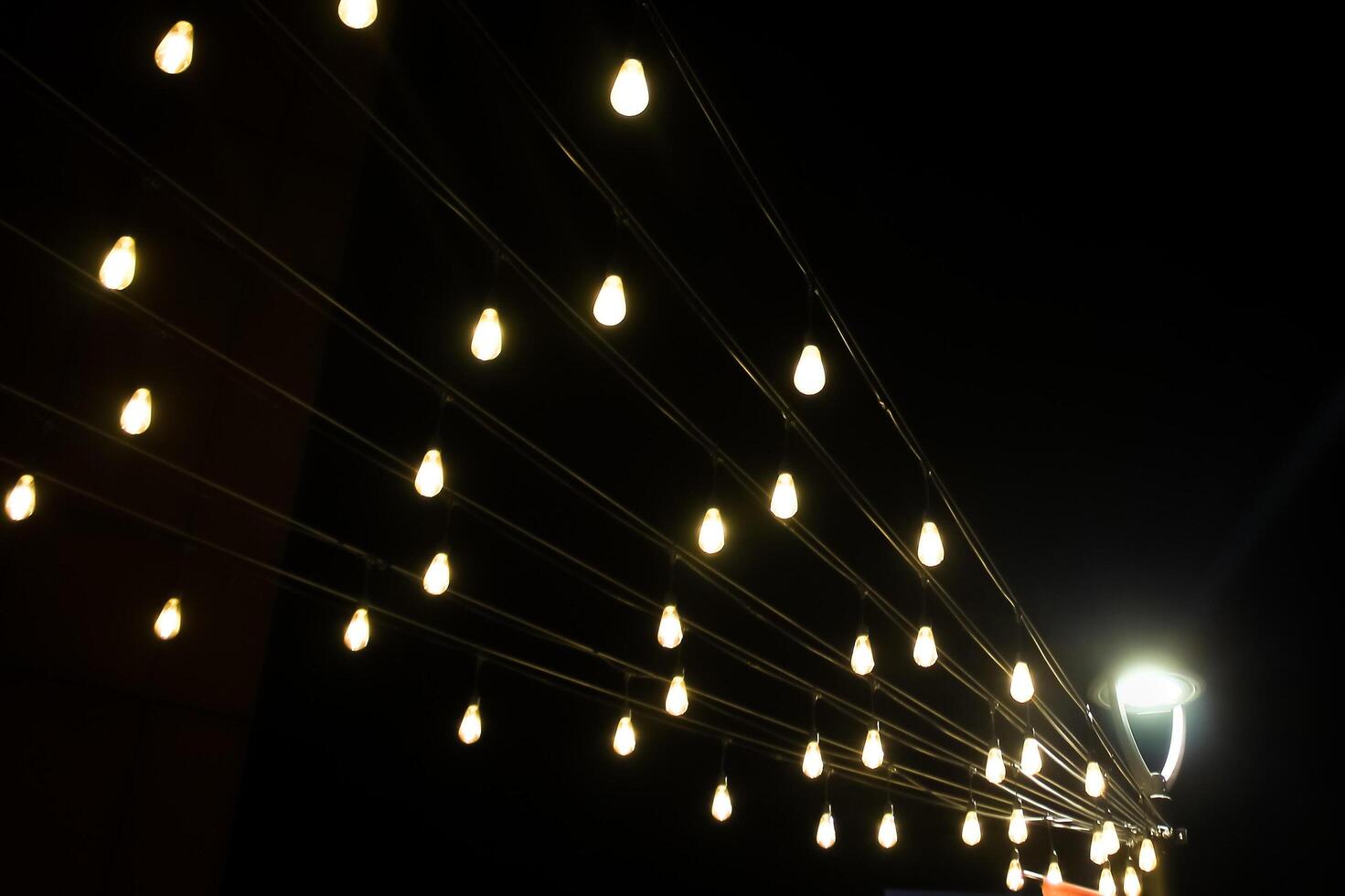 Street lights form patterns at night photo