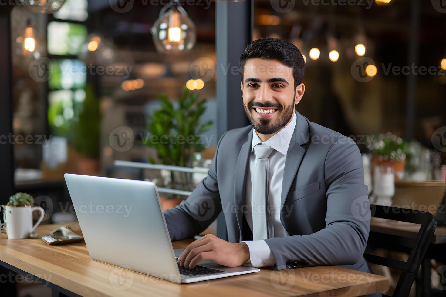 AI generated A smiling businessman sitting on workdesk with a laptop in front. photo