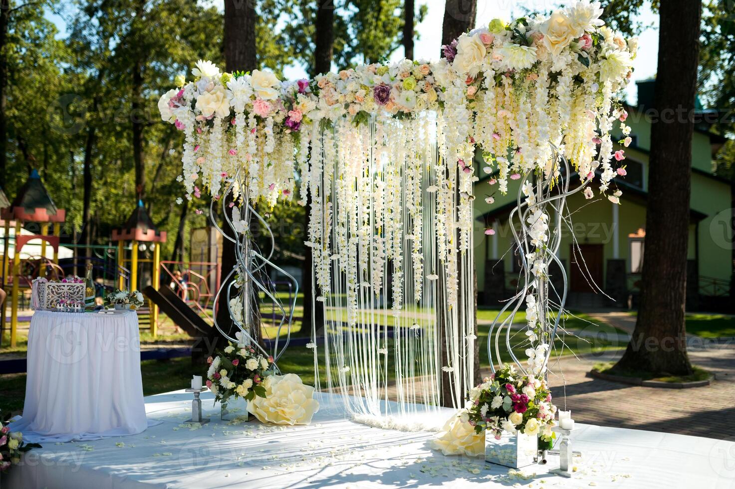 Flower wedding arch for the ceremony. Arch for the wedding ceremony, decorated with flowers photo