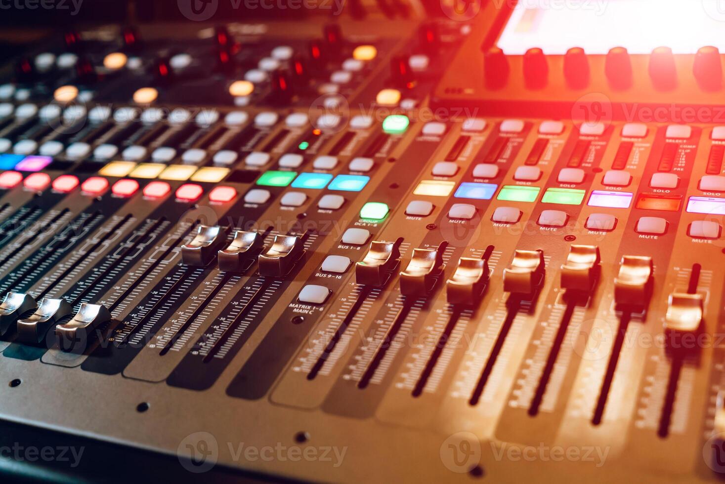 Remote sound engineer. Many buttons of black audio mixer board console. Music equipment. Close-up photo