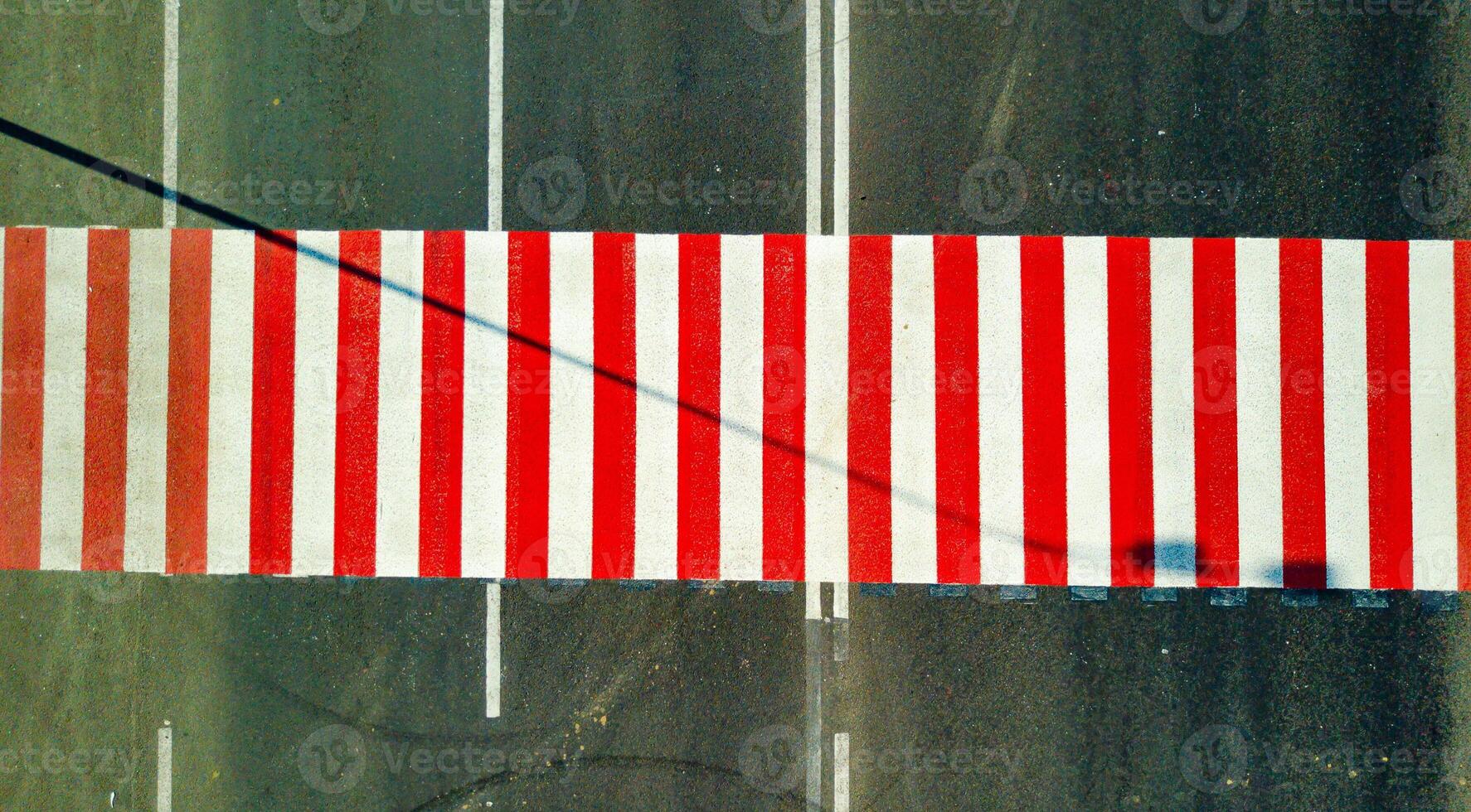 a new pedestrian road in white and red stripes. Close-up photo