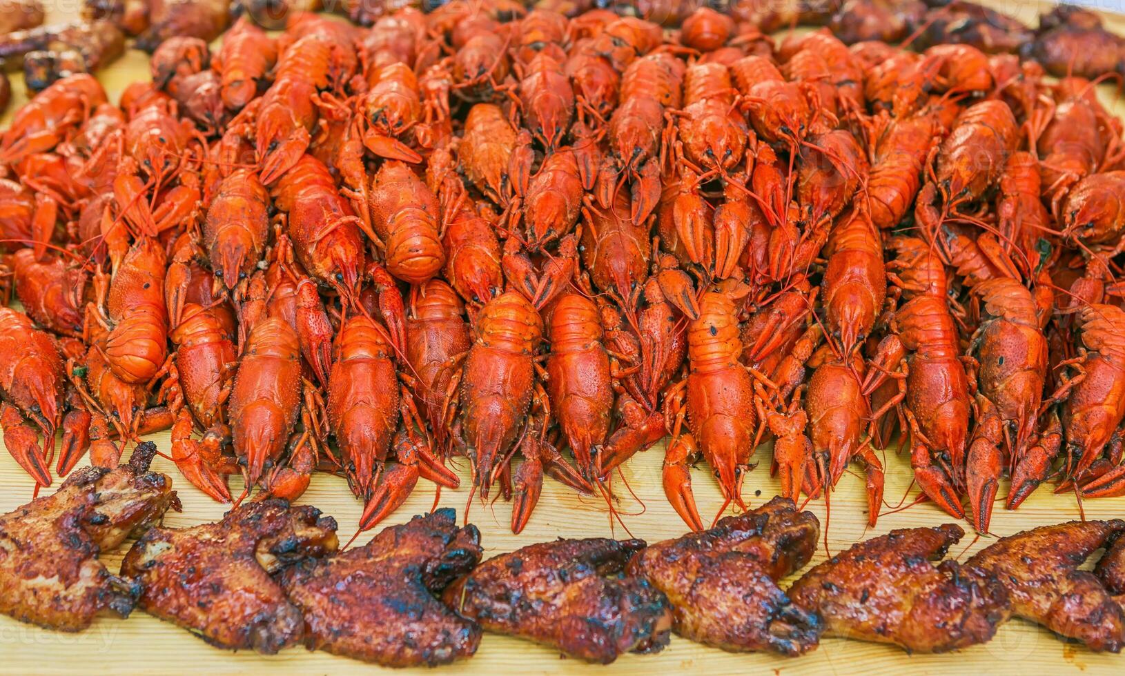 Crawfish. Boiled red crawfish. Crawfish ready to eat. Beer snack. Crayfish to beer. photo