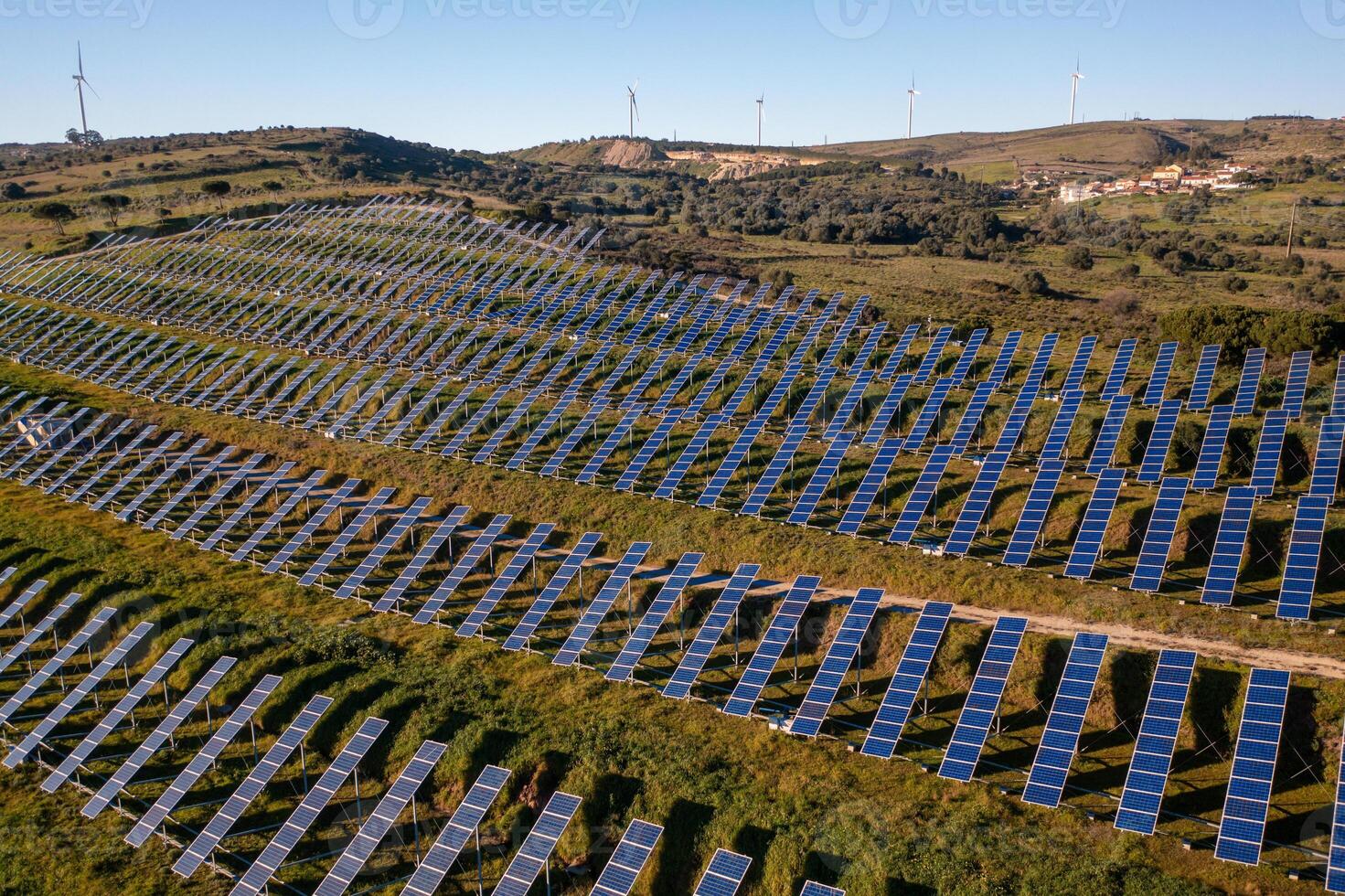Aerial view flying over a solar panel farm photo
