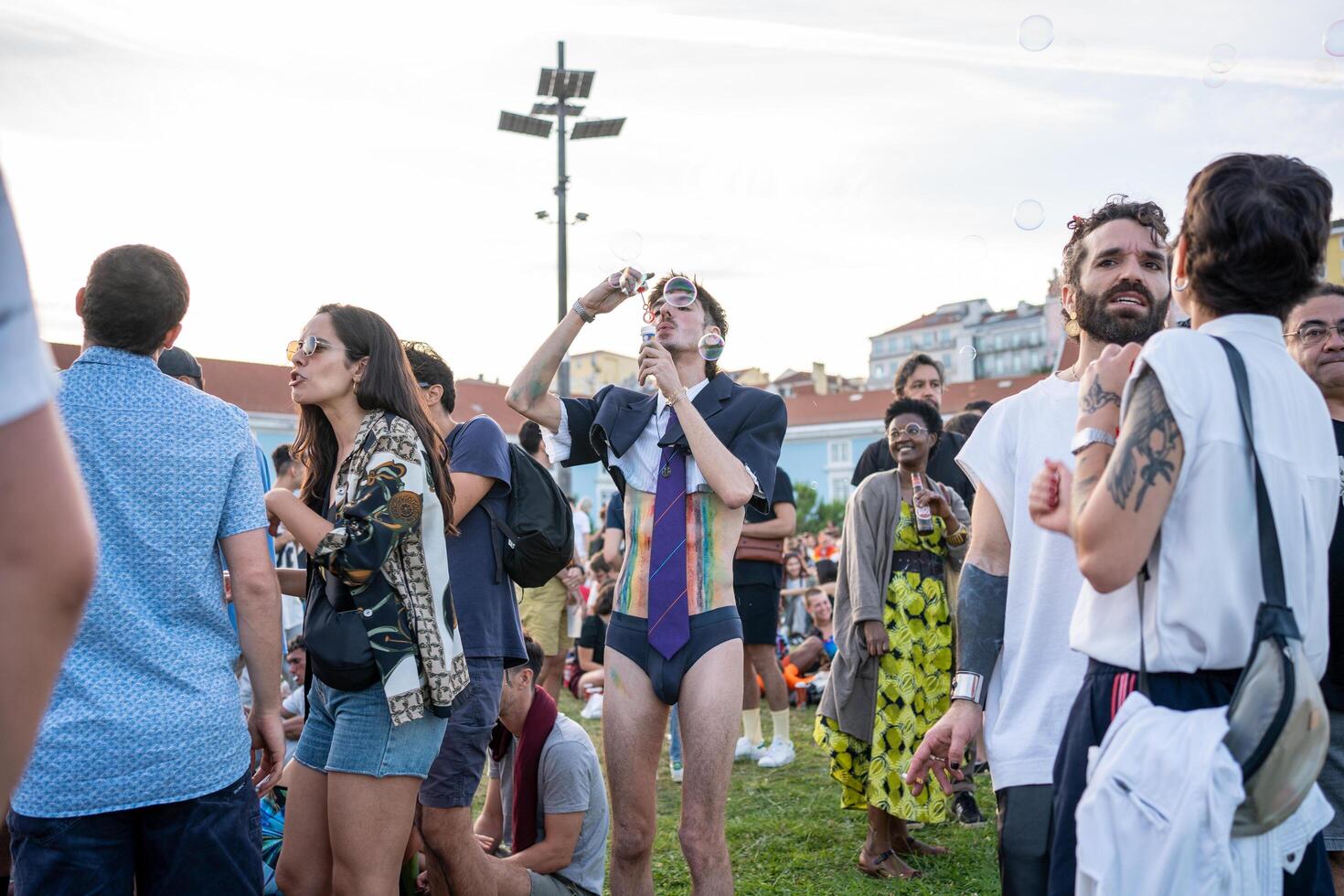 Lisbon, Portugal. 17 June 2023. Gay blowing soap bubbles at Pride Parade photo