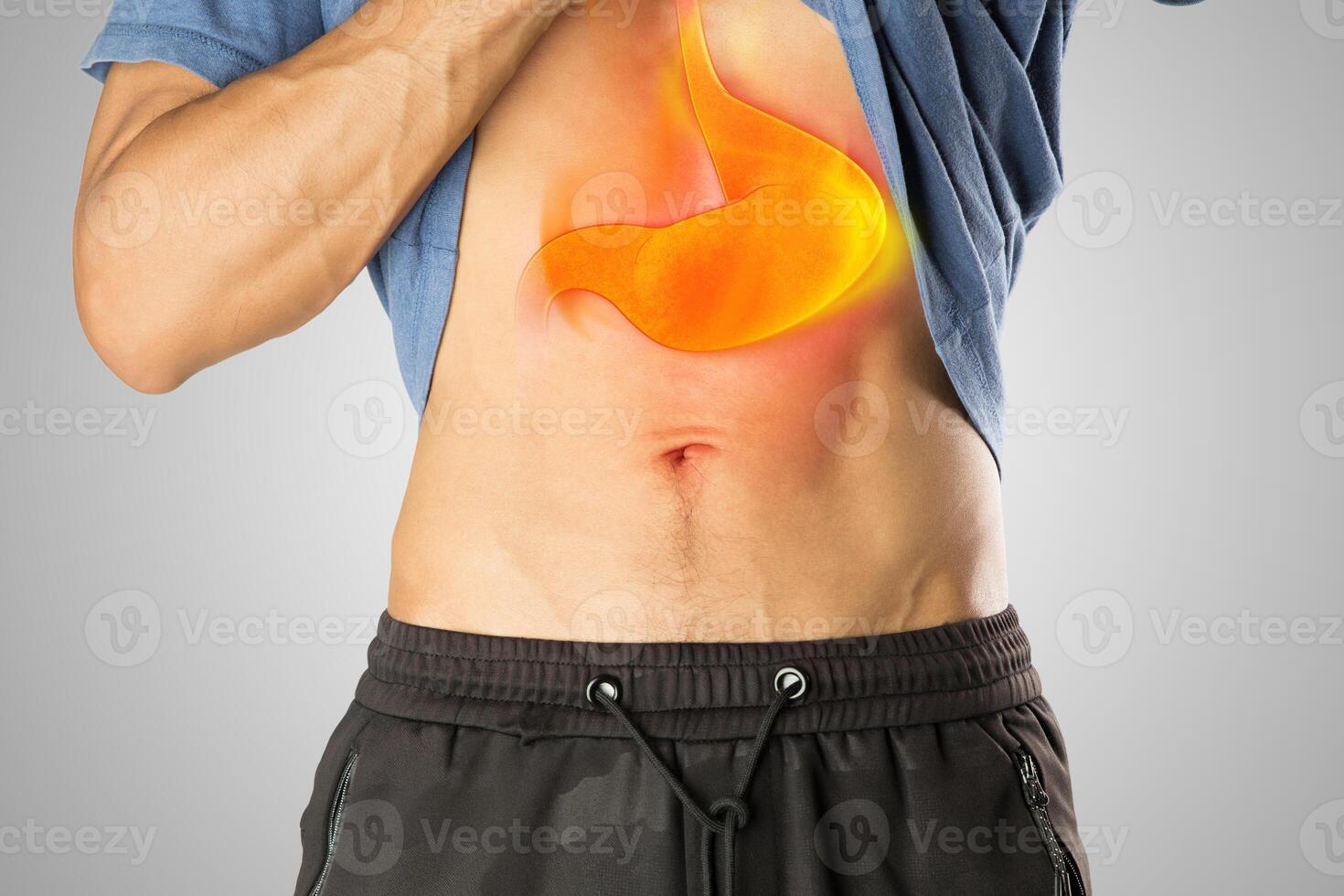 A man has symptoms of acid reflux. photo