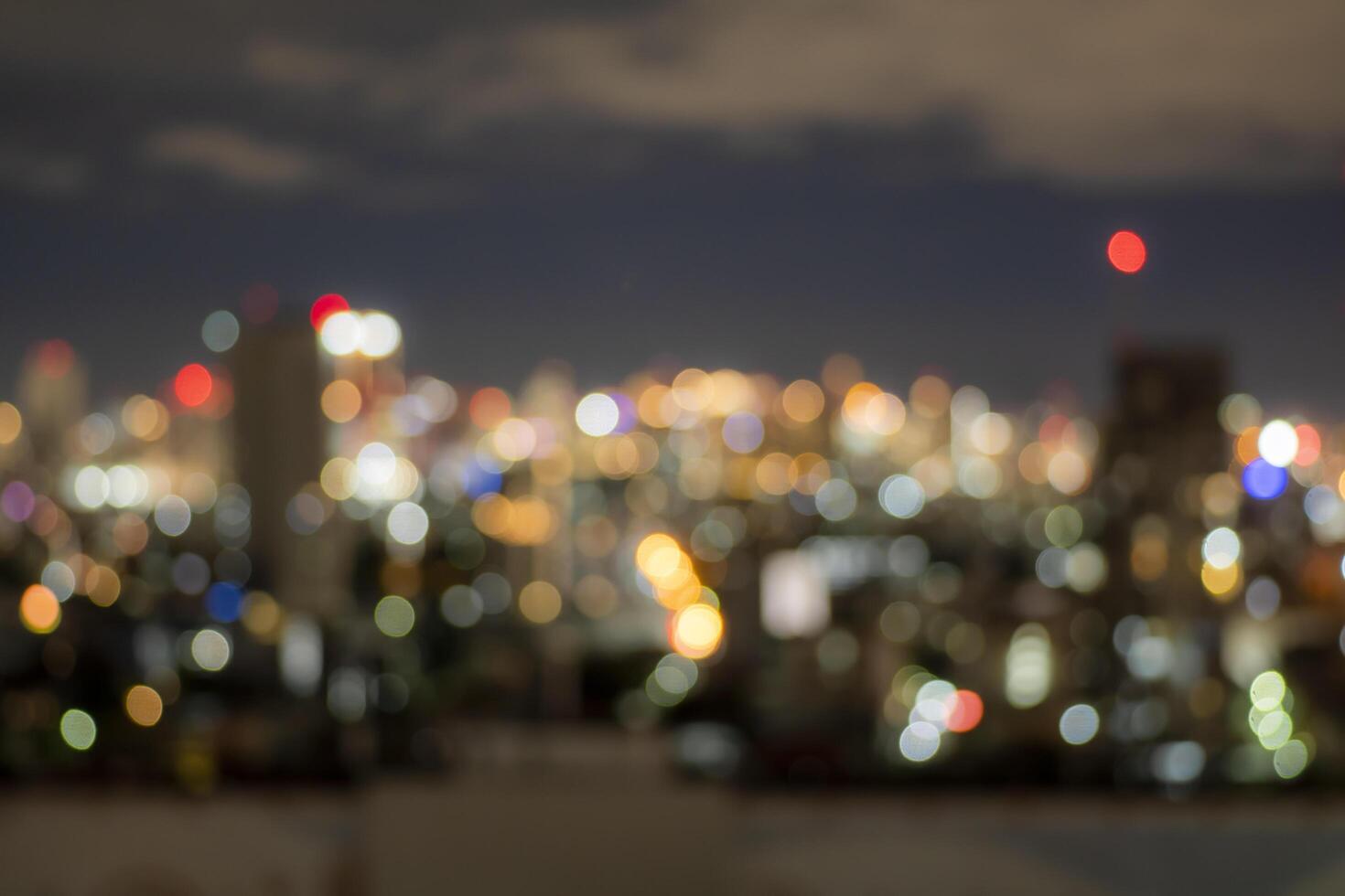 Blurred of night city skyscraper and tower lights bokeh , Soft Focus , Metropolis Backgound wallpaper photo