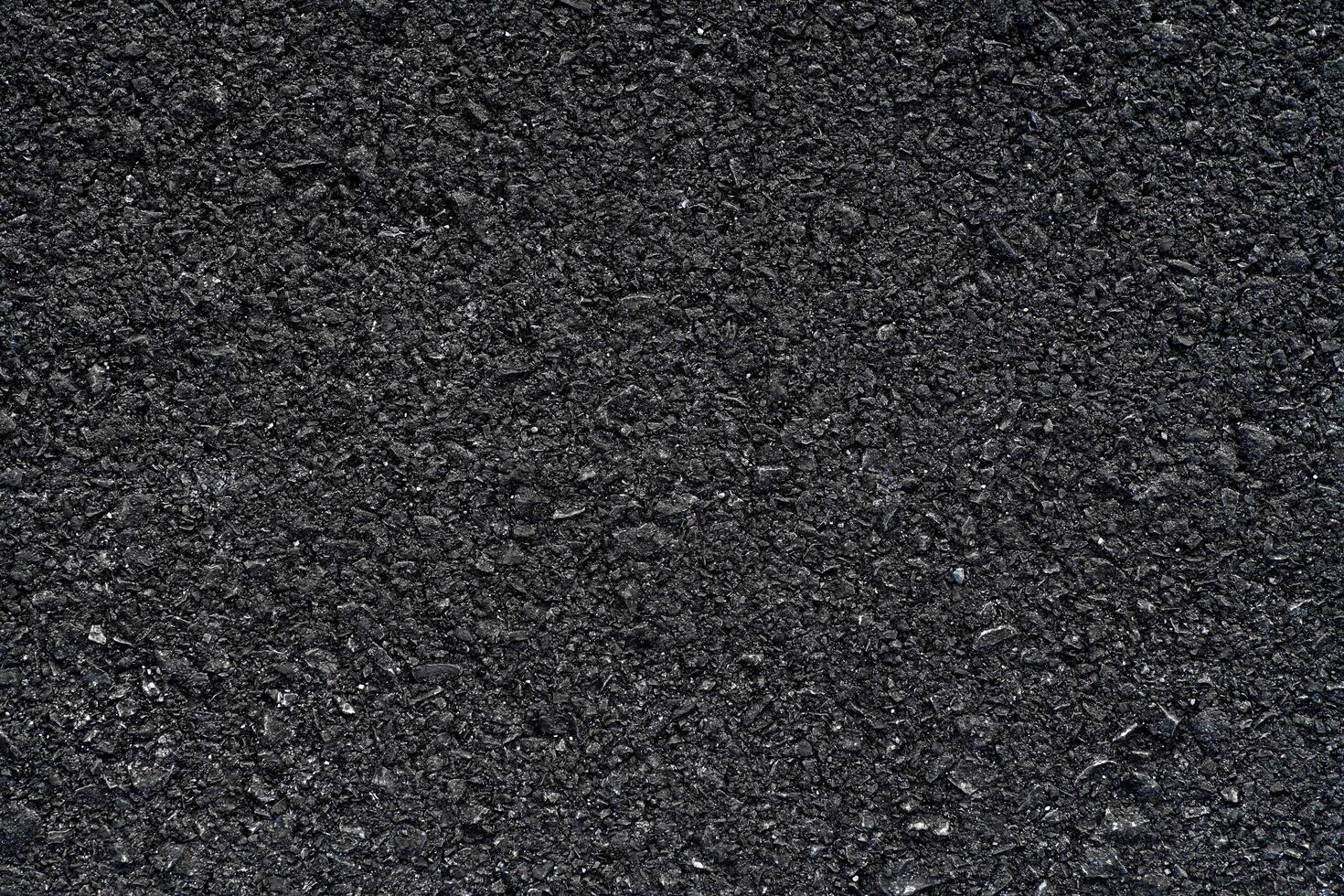 Dark Texture details of surface of asphalt or tamac on new road, background or wallpaper, meterial cpncept design photo