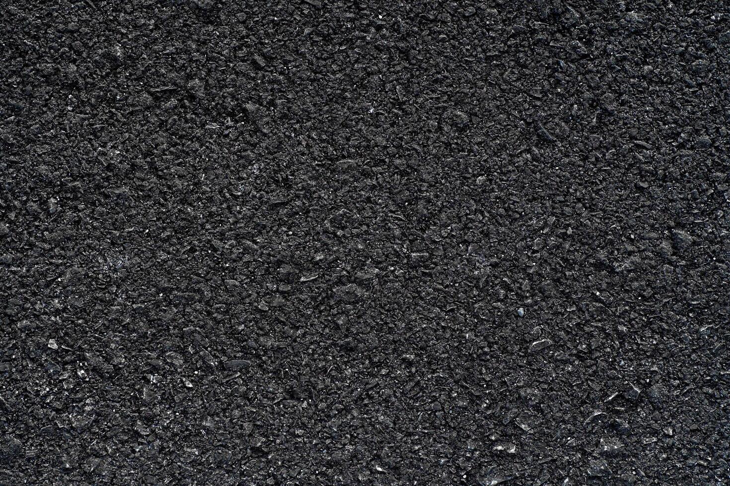Dark Texture details of surface of asphalt or tamac on new road, background or wallpaper, meterial cpncept design photo