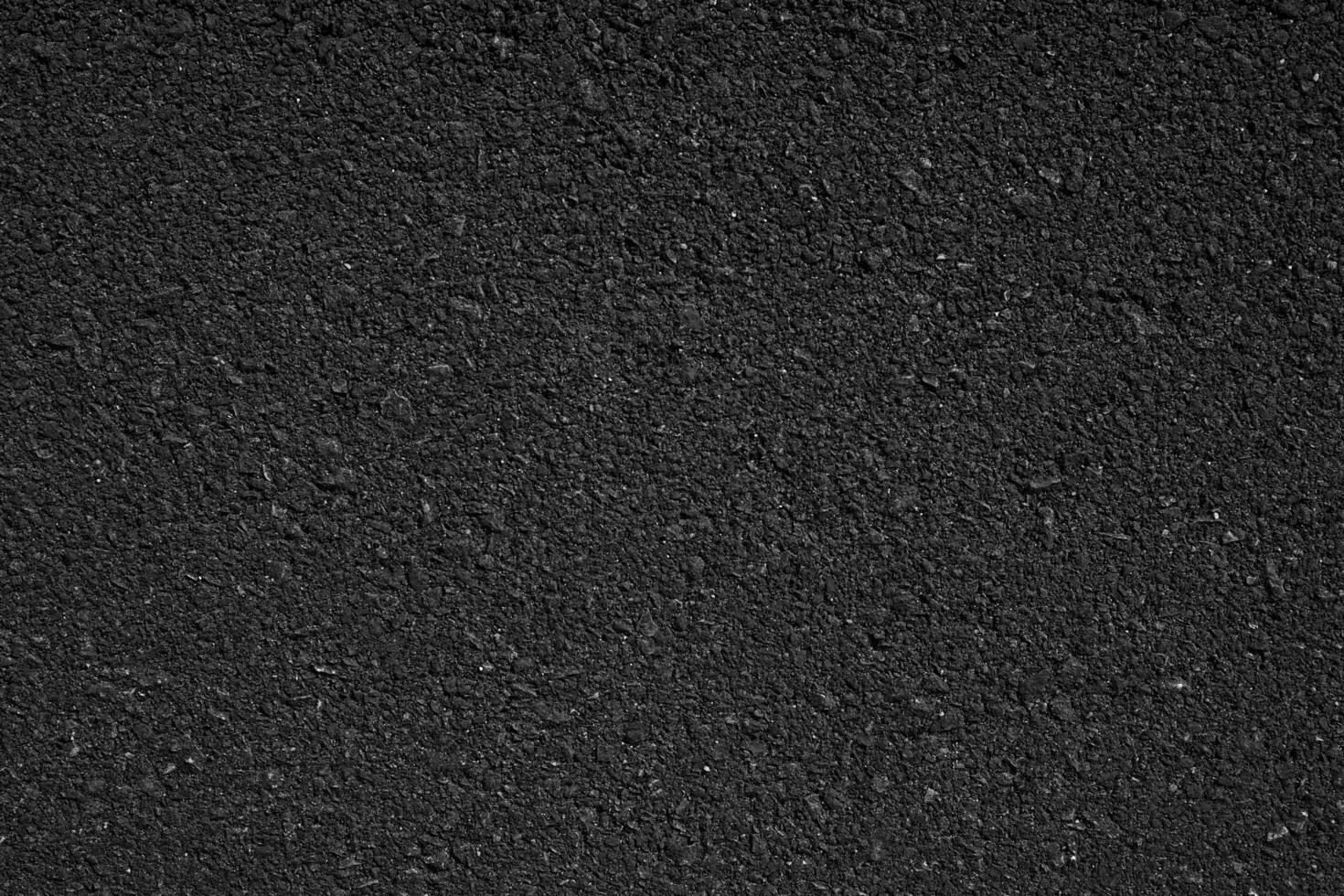 Dark Texture details of surface of asphalt or tamac on new road, background or wallpaper, meterial cpncept design photo