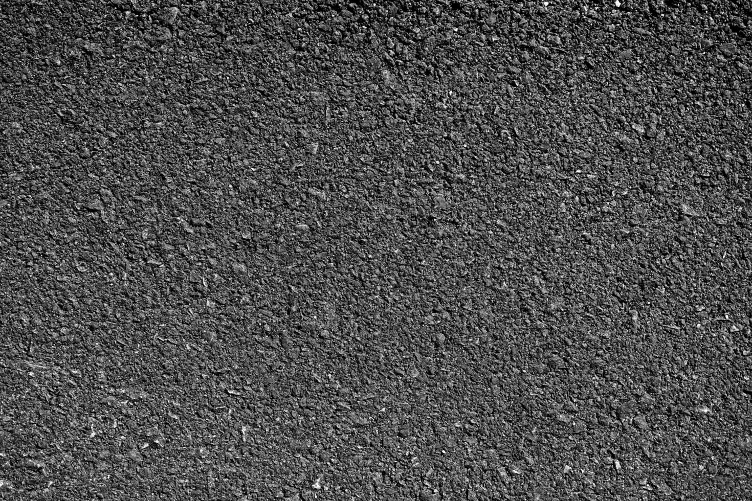 Dark Texture details of surface of asphalt or tamac on new road, background or wallpaper, meterial cpncept design photo