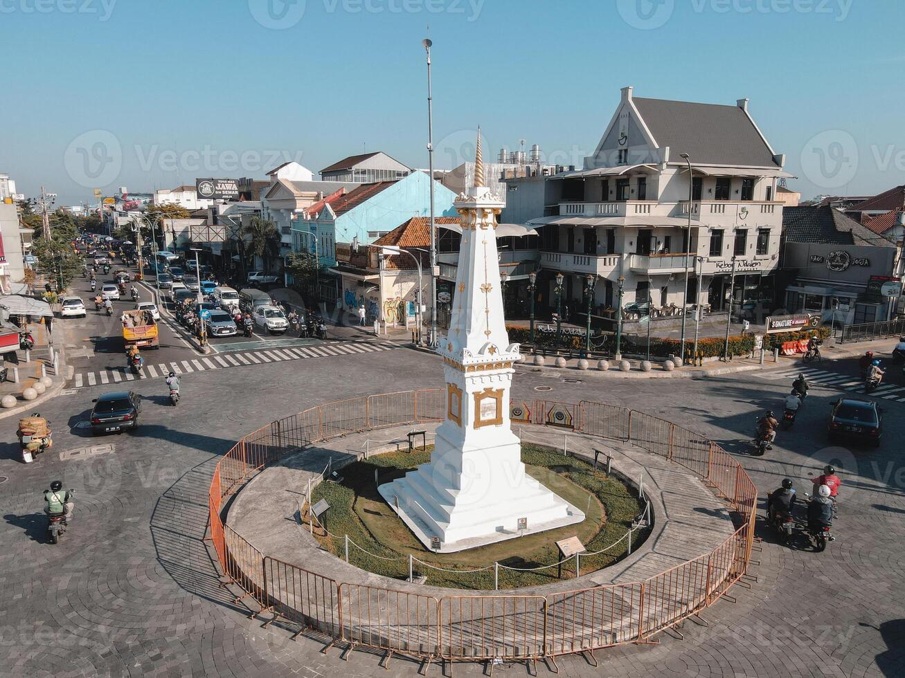 Aerial view of Tugu Yogyakarta Landmark with busy traffic. photo
