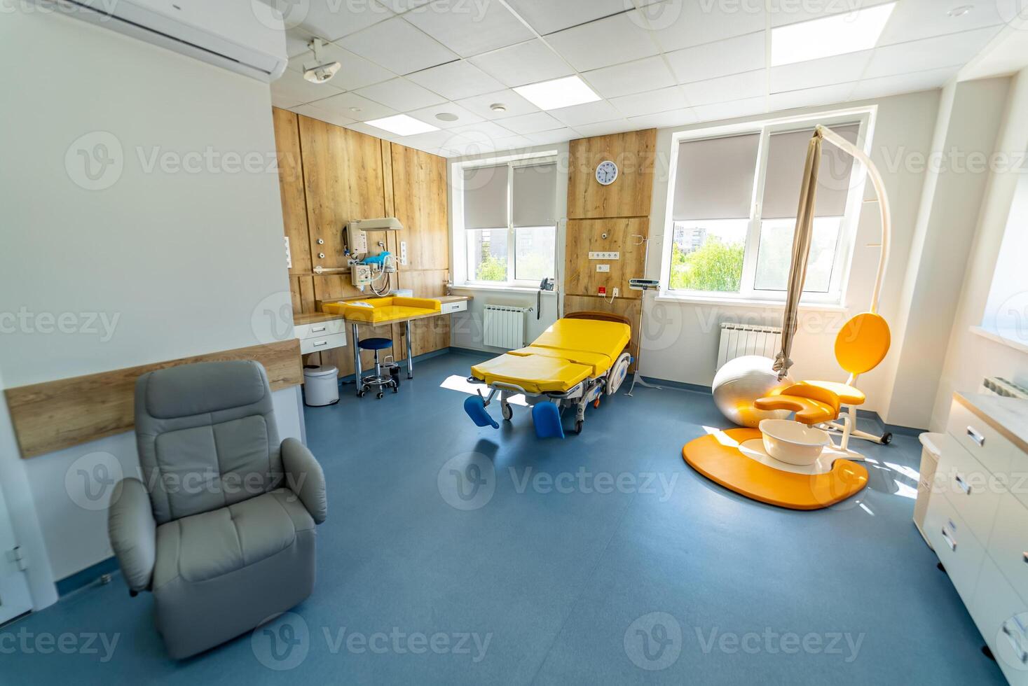 Modern light ward of maternity hospital. Empty patient beds in a maternity ward. photo