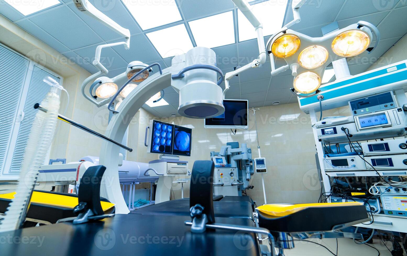 Equipment and medical devices in modern operating room. Operating theatre. Selective focus. photo