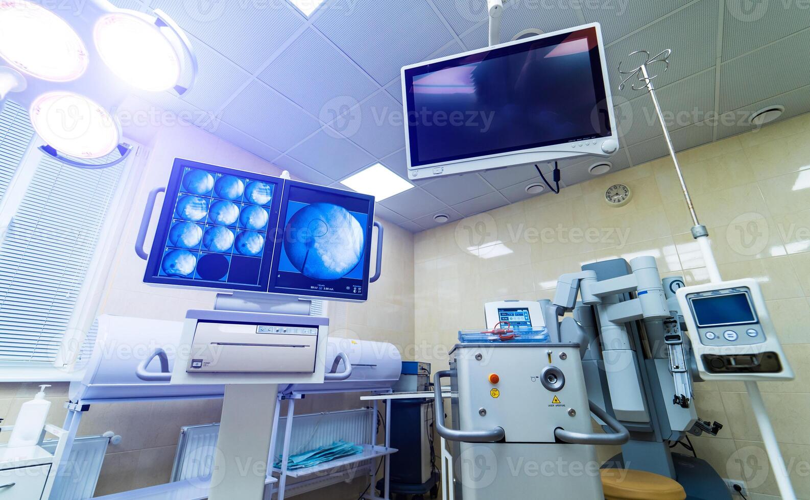 Medical devices, Interior hospital design concept. Interior of operating room in modern clinic, screen with tests closeup photo