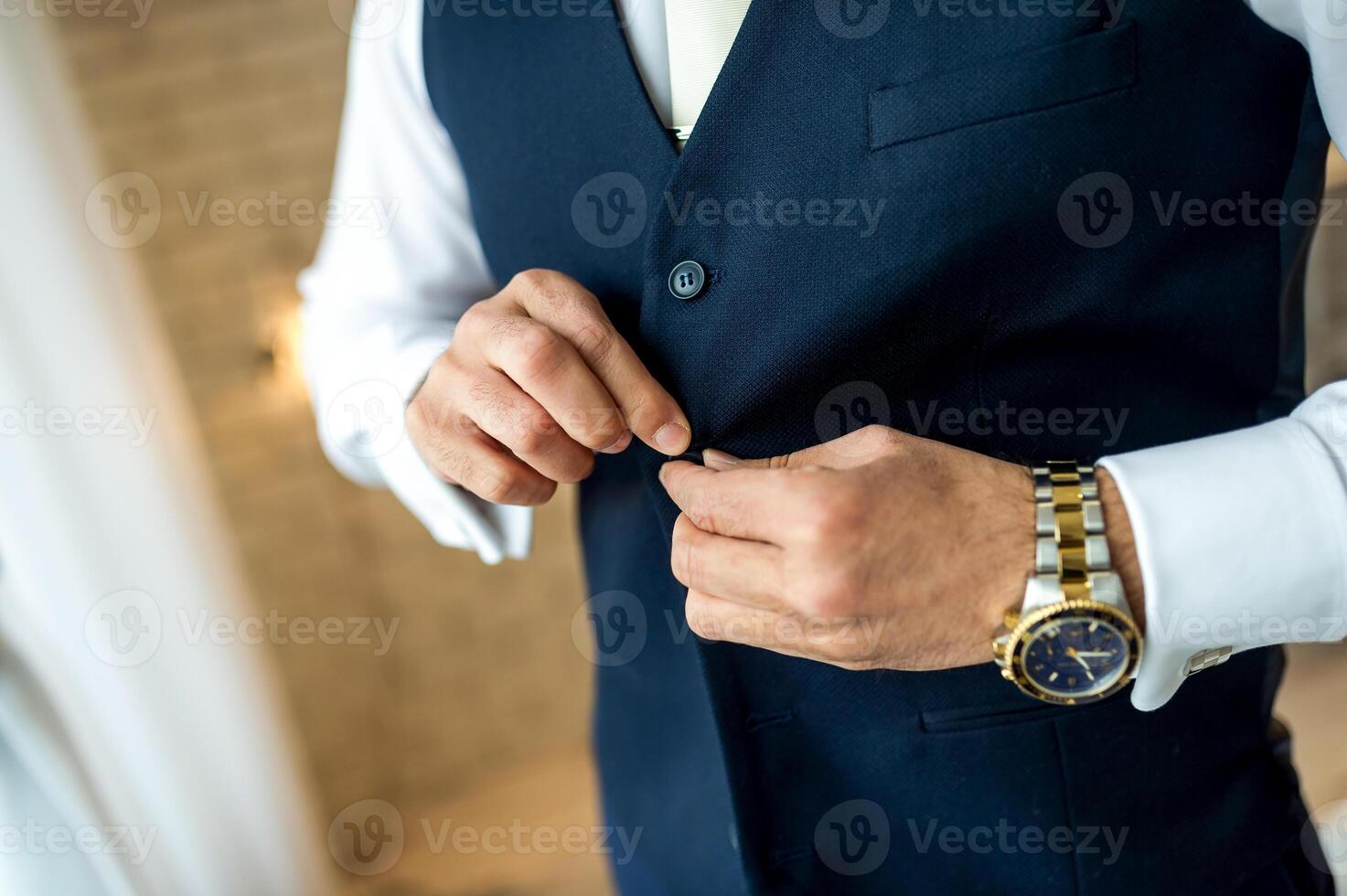 business man button his jacket. Man getting ready for work photo