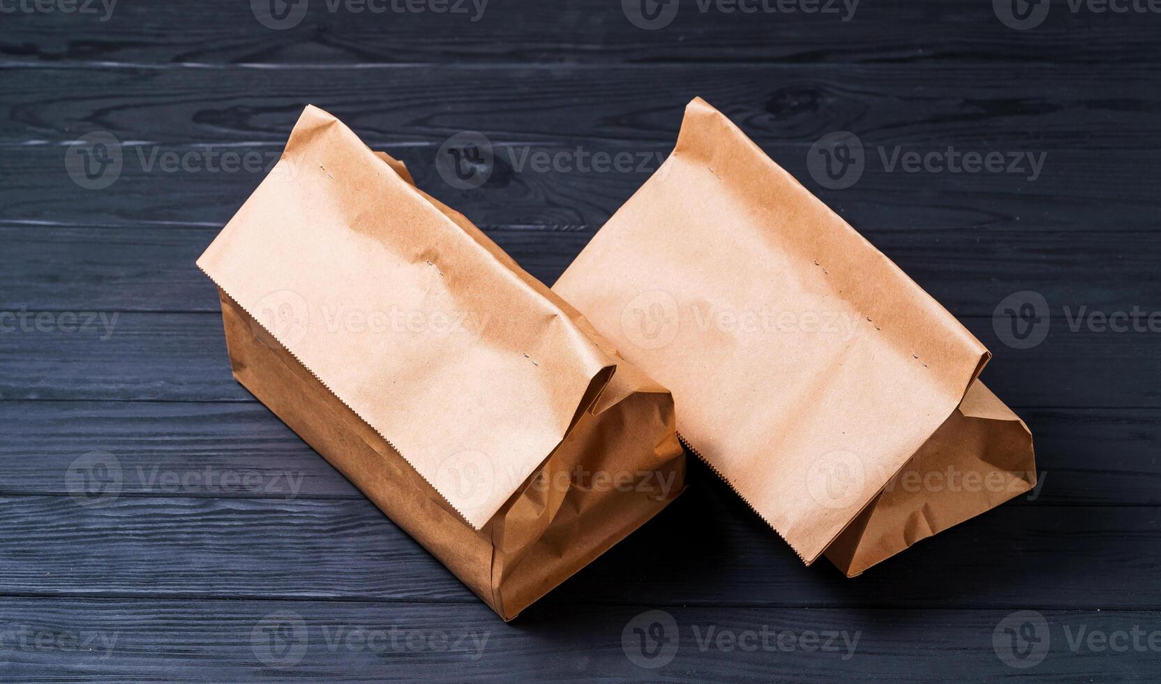food delivery in eco-friendly packaging on a dark background photo