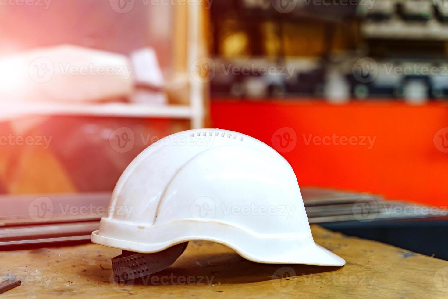 Plastic helmet for workers security. Close up view of helmet for security on construction site photo